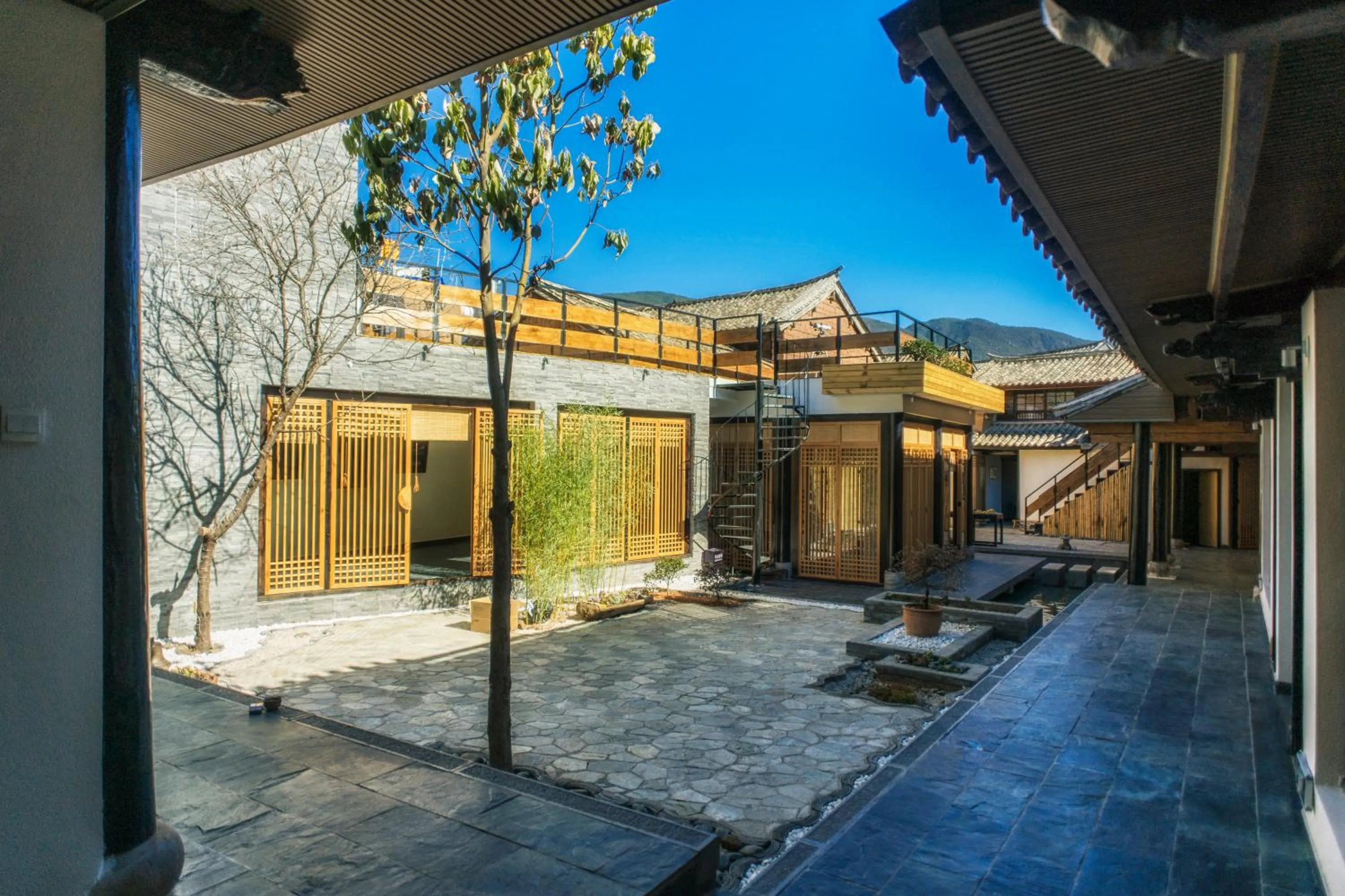 Garden in Dali Shaxi Qing Jing Courtyard