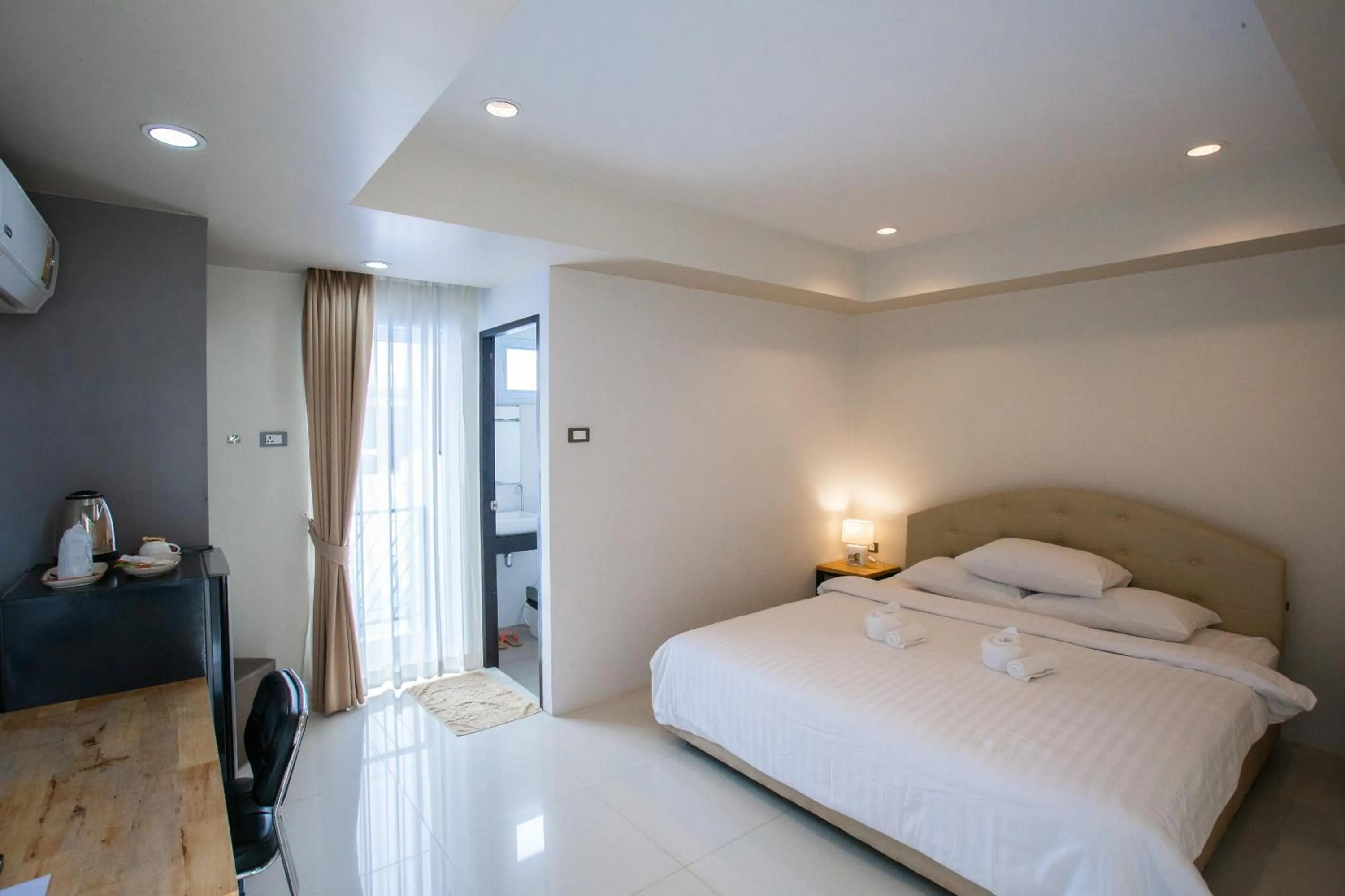 Bed in Le Neuf Nakorn Lampang