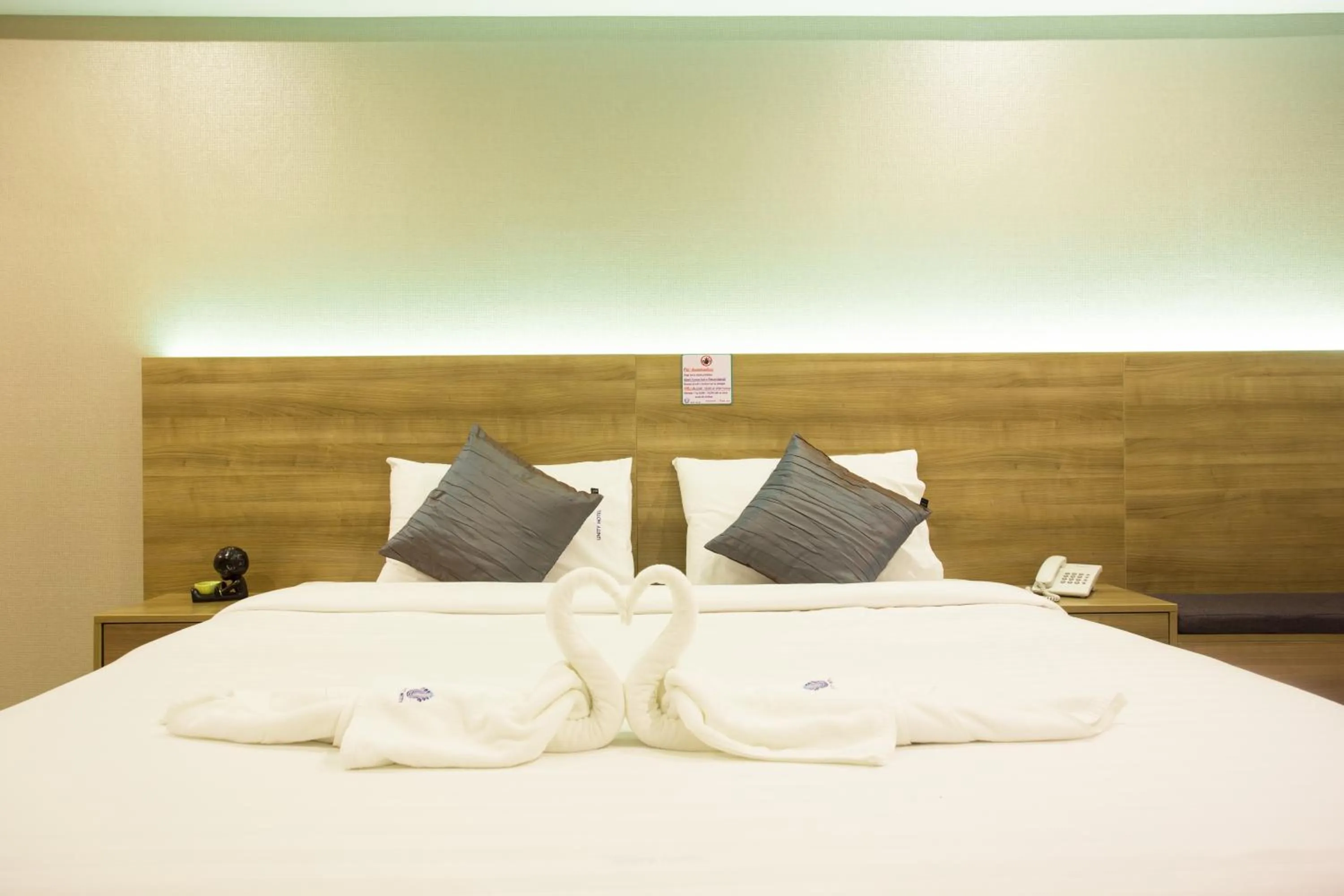 Property building, Bed in Unity Hotel