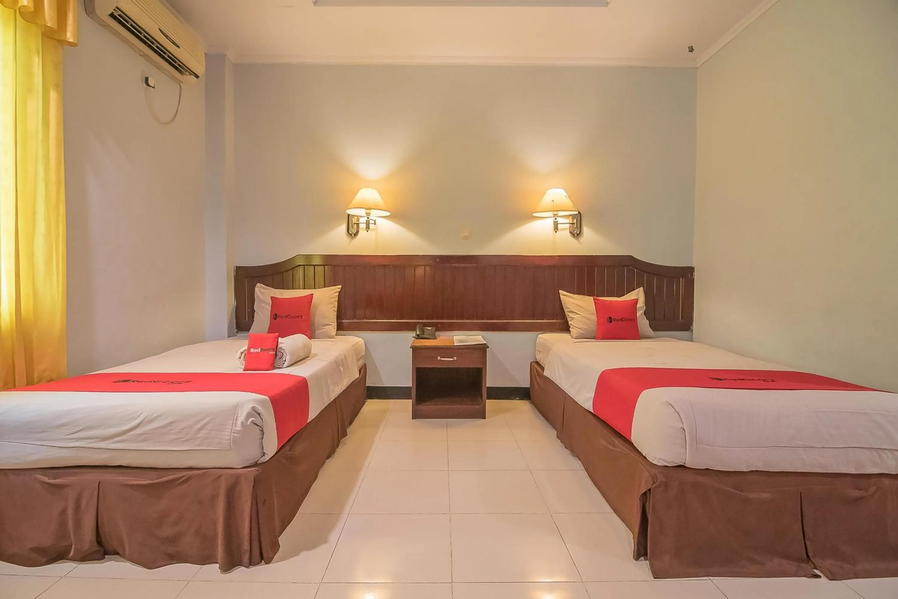 Bed in RedDoorz Syariah at Grand Taufiq Tarakan