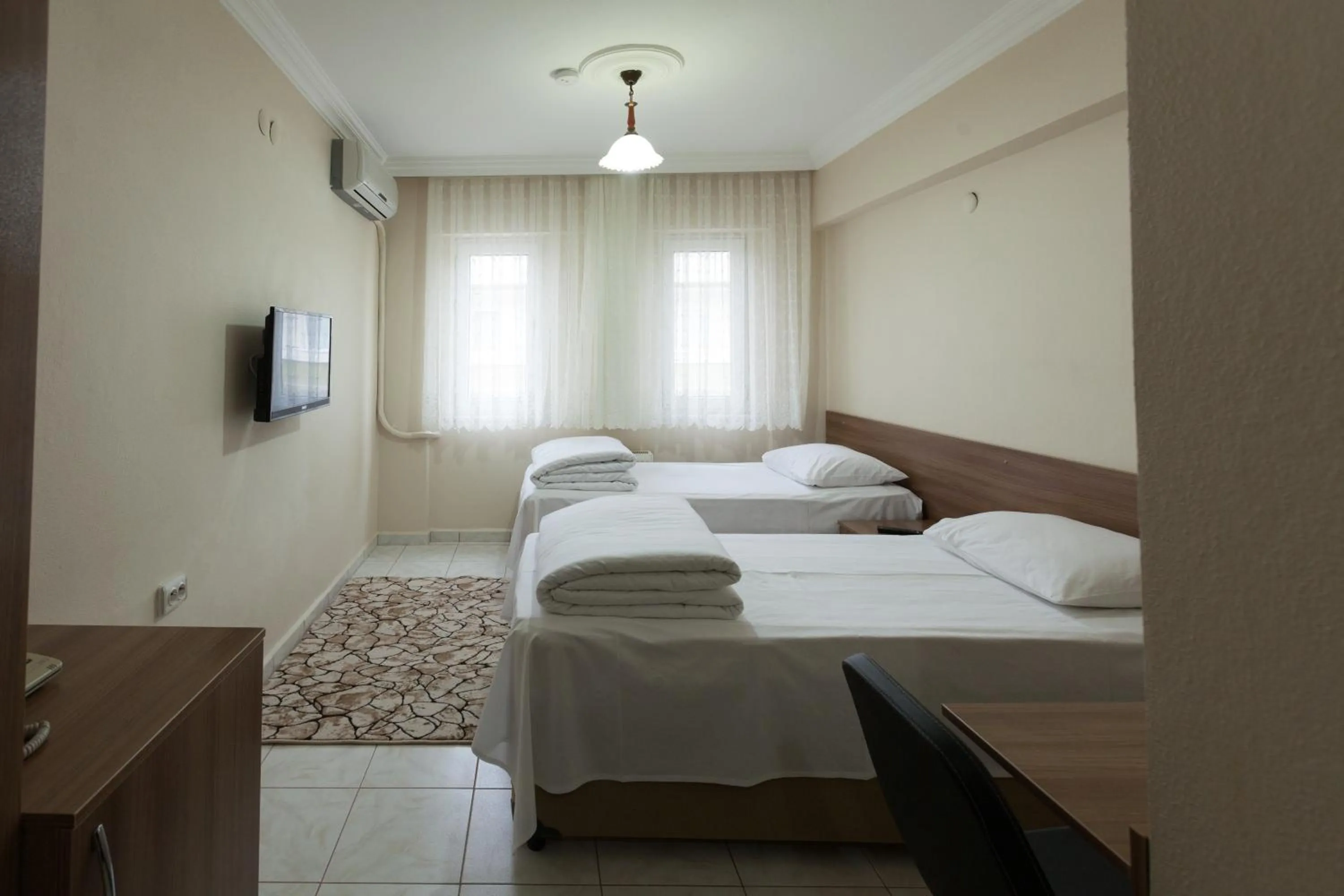 Photo of the whole room, Bed in Gizem Pansiyon
