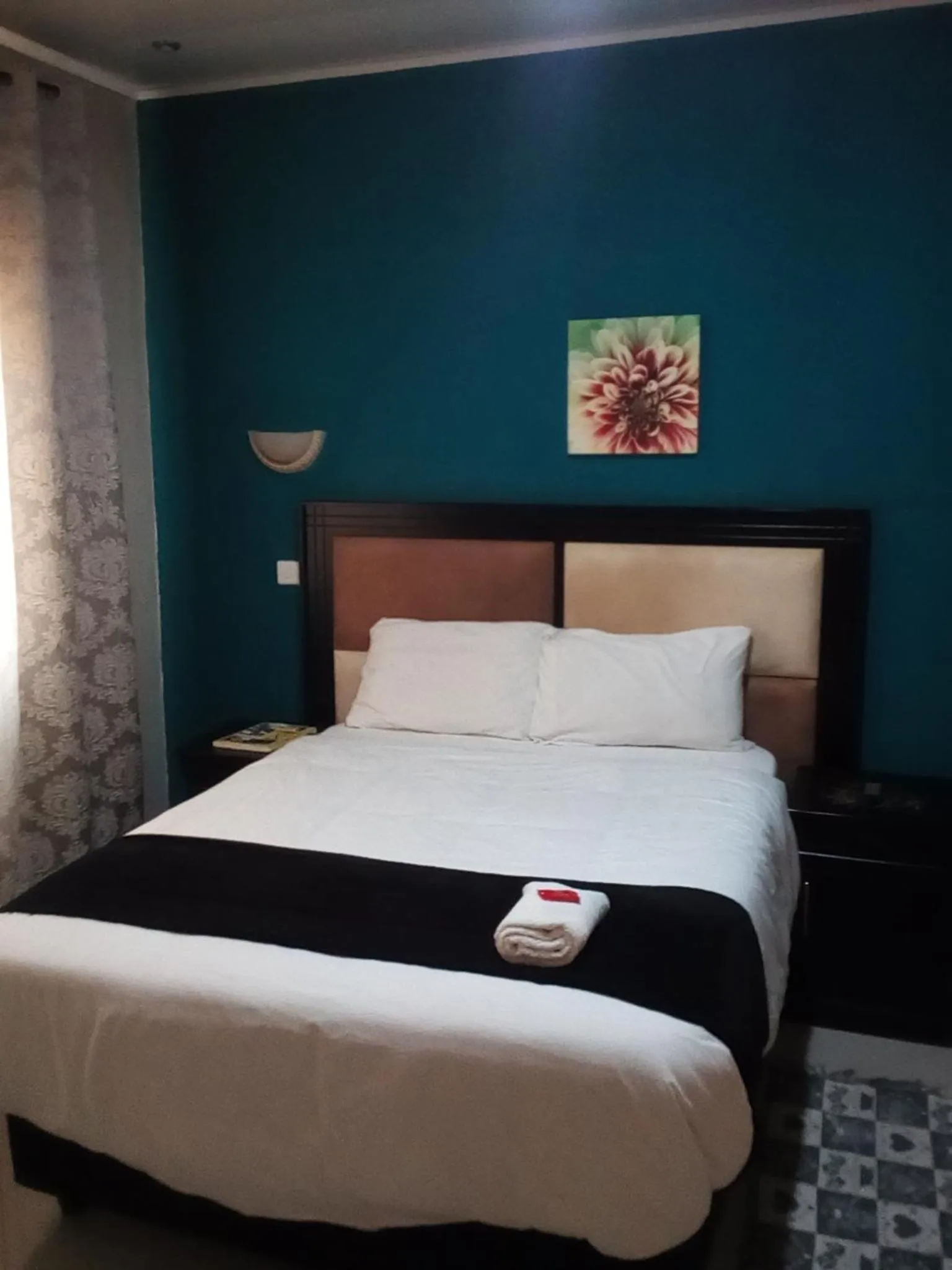 Bed in Royal Olympia Lodges and Safaris Livingstone