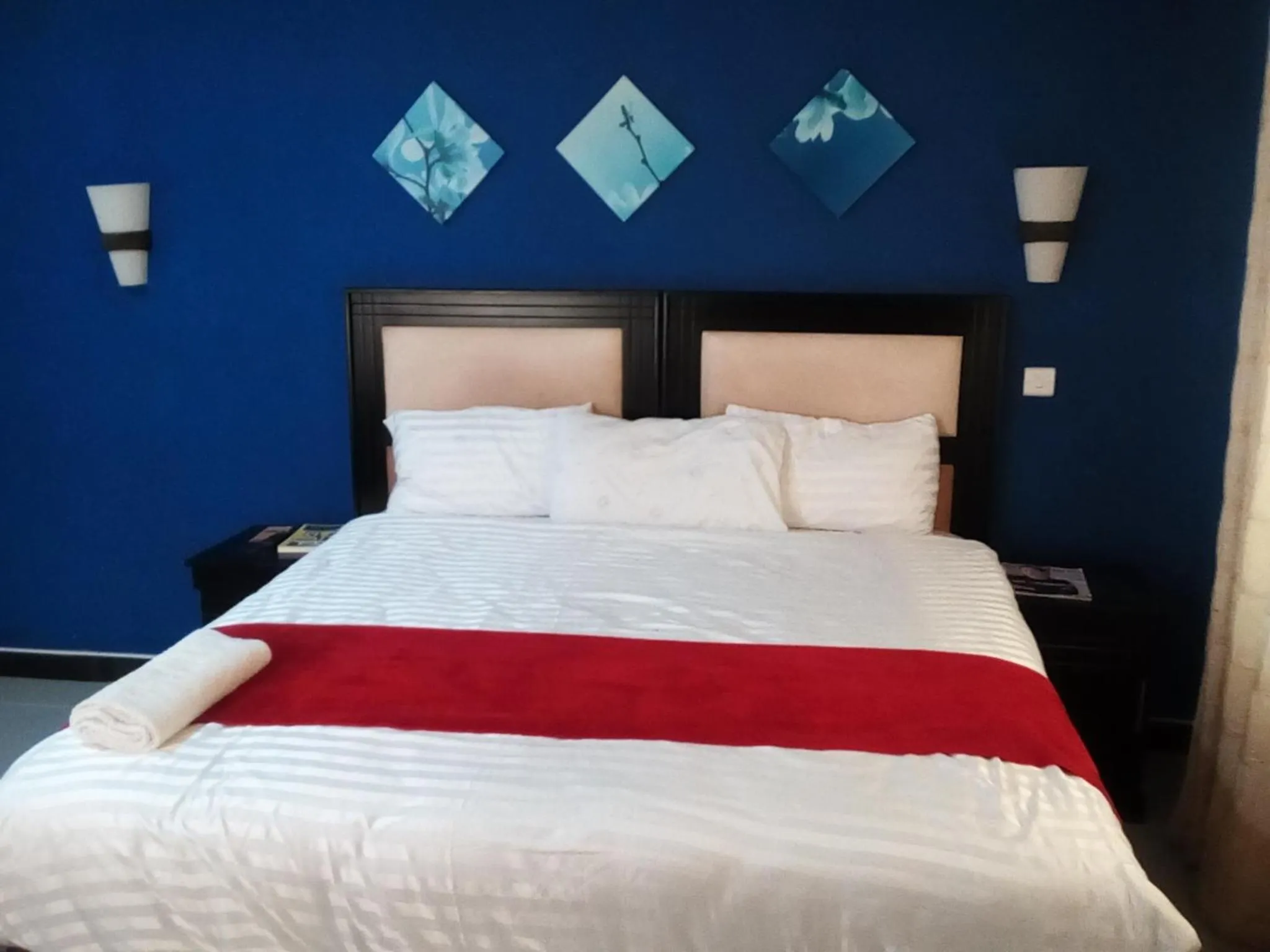 Bed in Royal Olympia Lodges and Safaris Livingstone