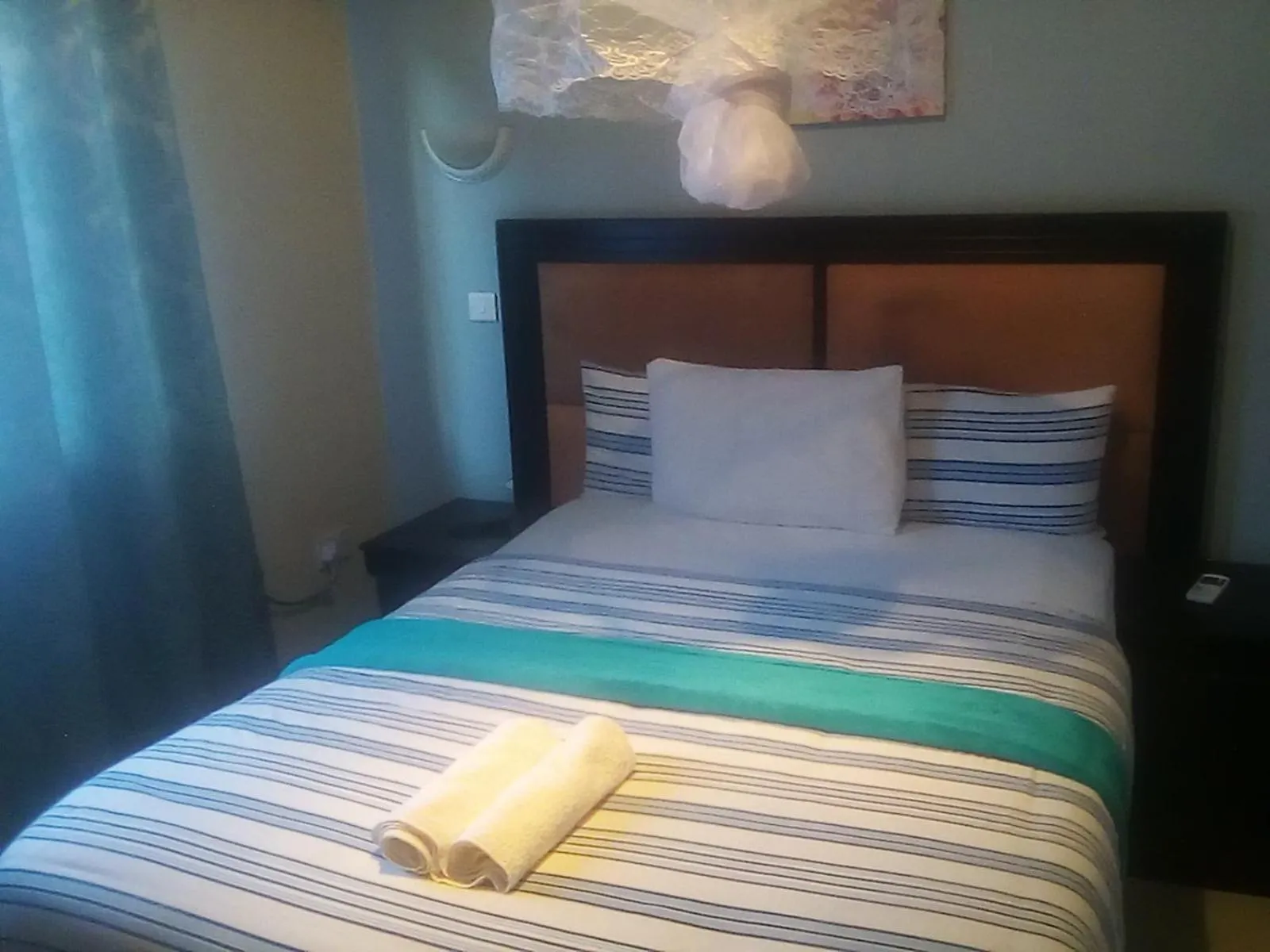 Bed in Royal Olympia Lodges and Safaris Livingstone