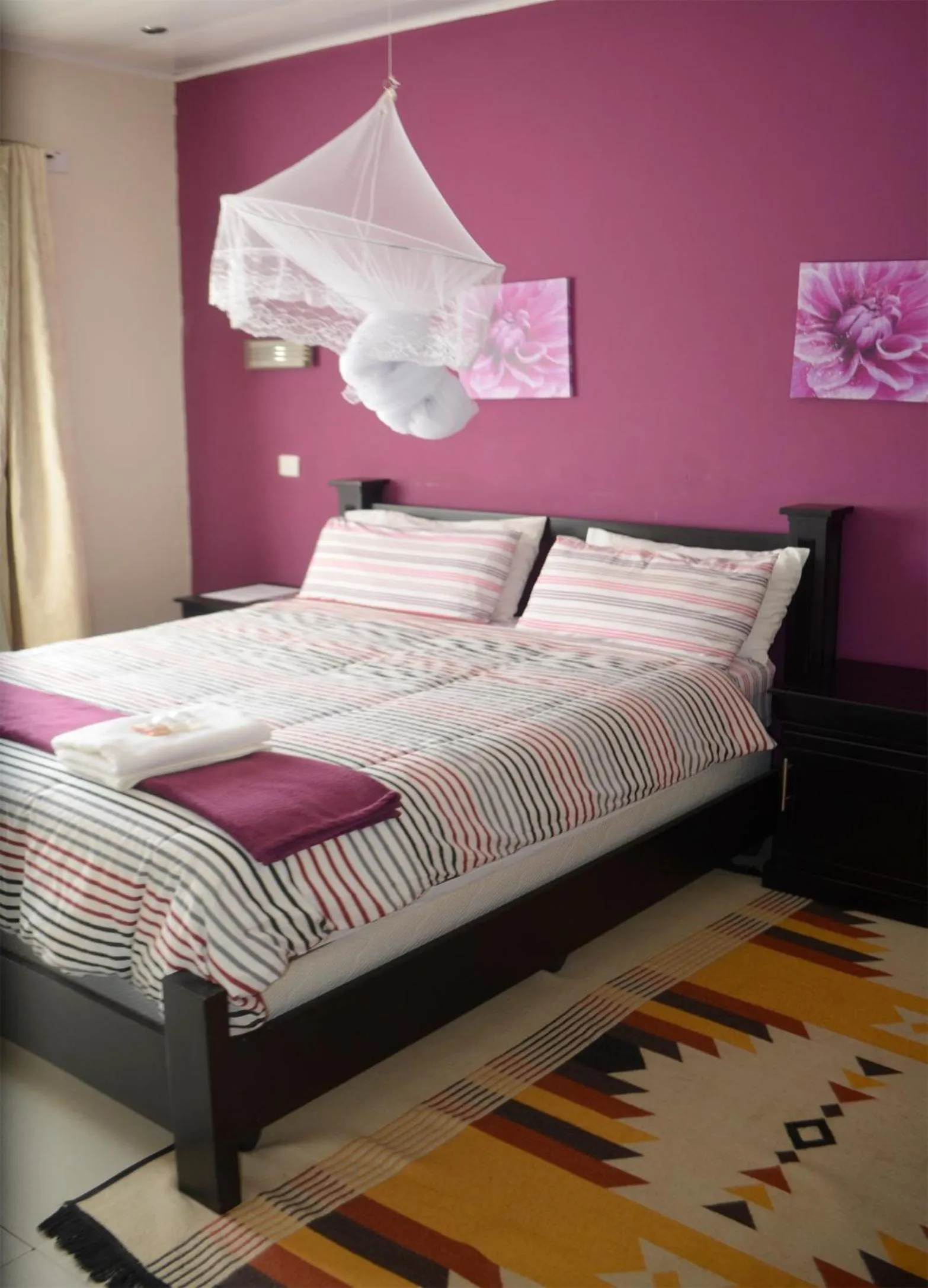 Bed in Royal Olympia Lodges and Safaris Livingstone