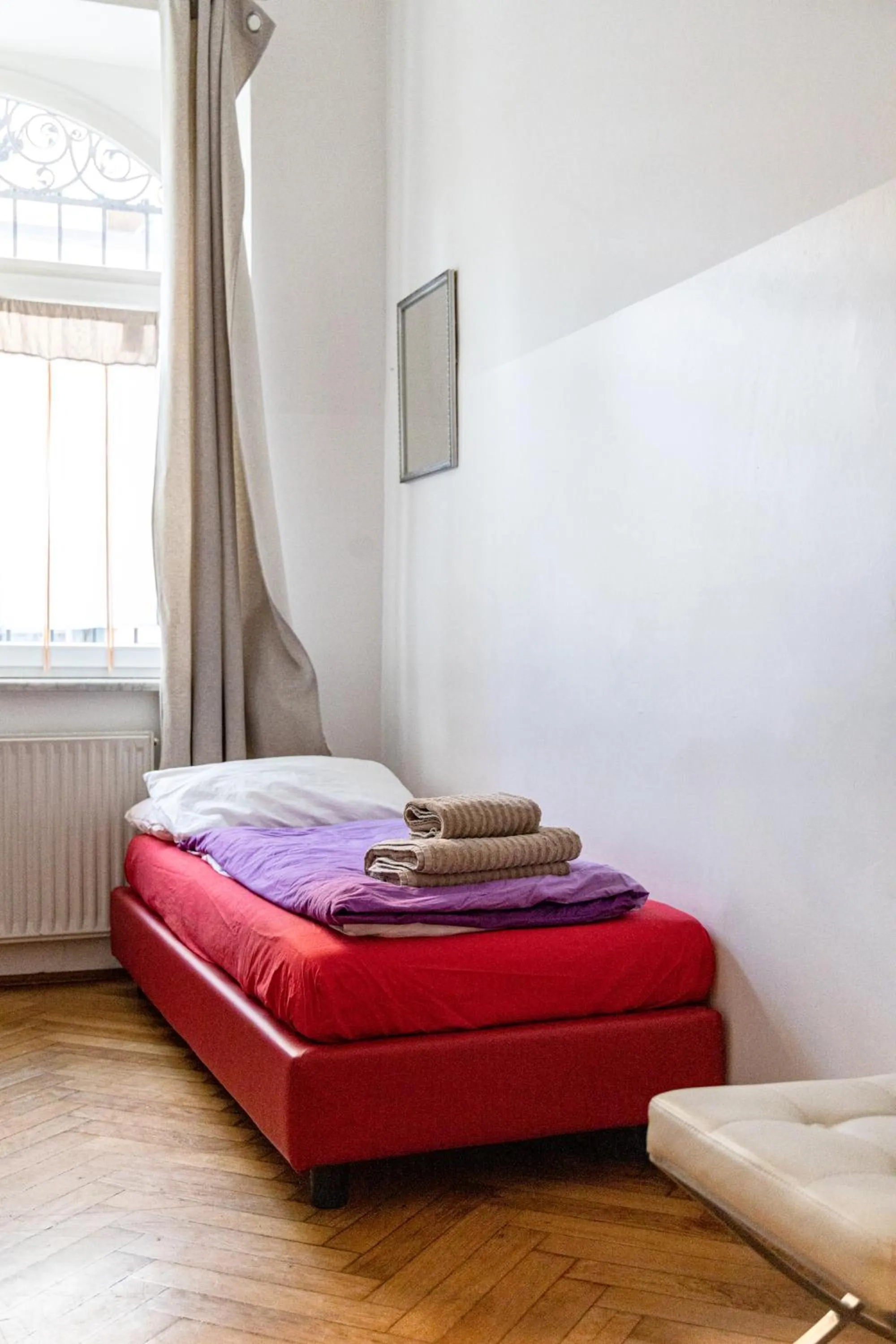 Bed in Bolzano Rooms