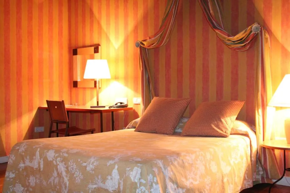 Bed in El Hotel De La Villa