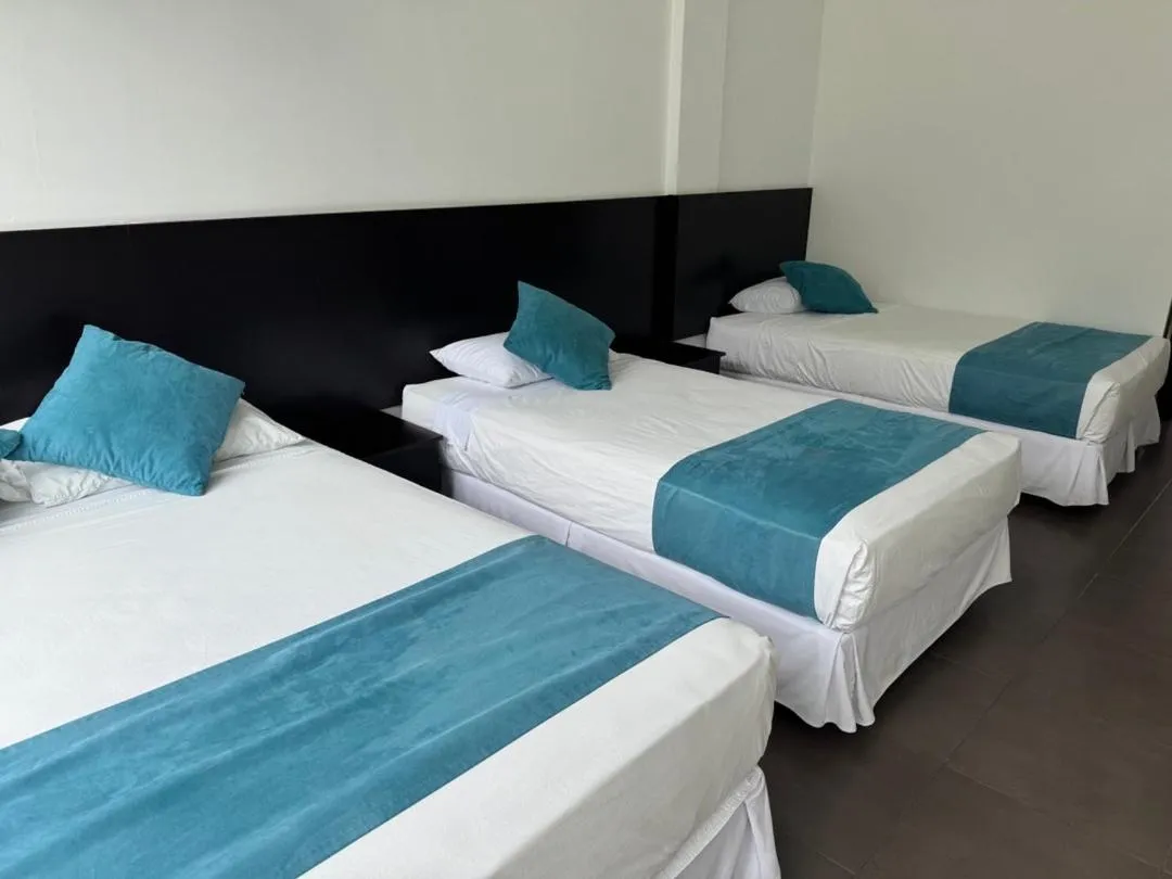 Bed in Ocean Blue Hotel