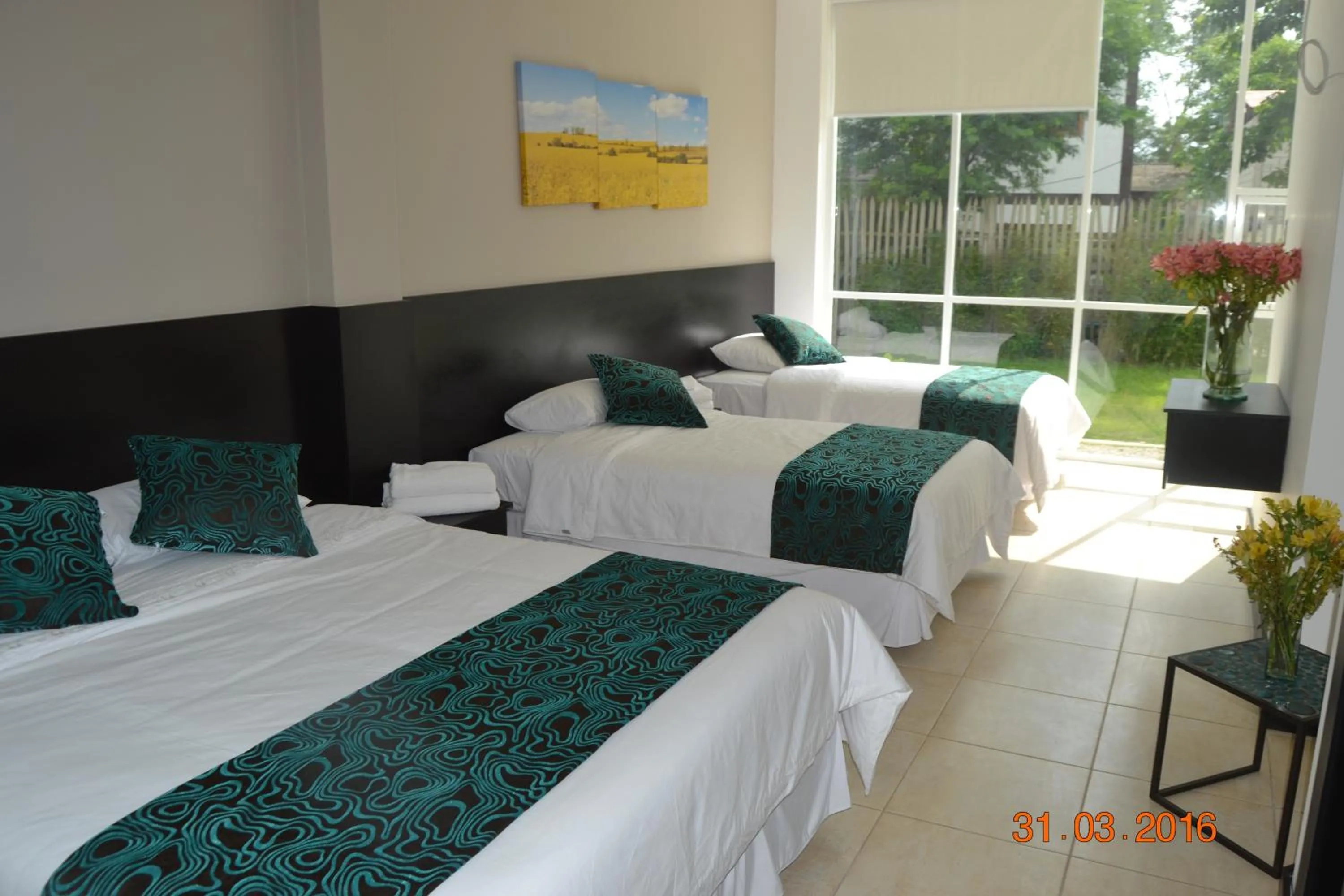 Bed in Ocean Blue Hotel