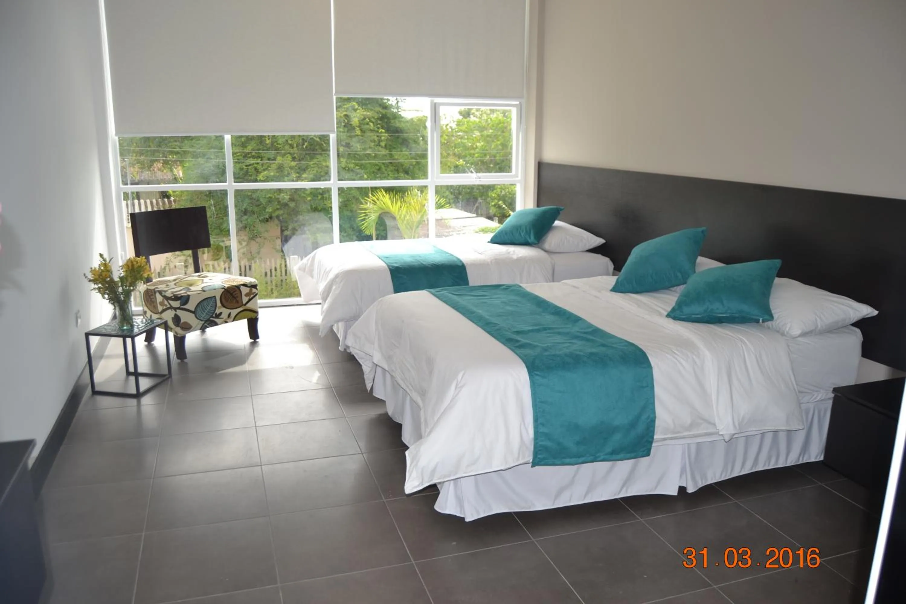 Bed in Ocean Blue Hotel