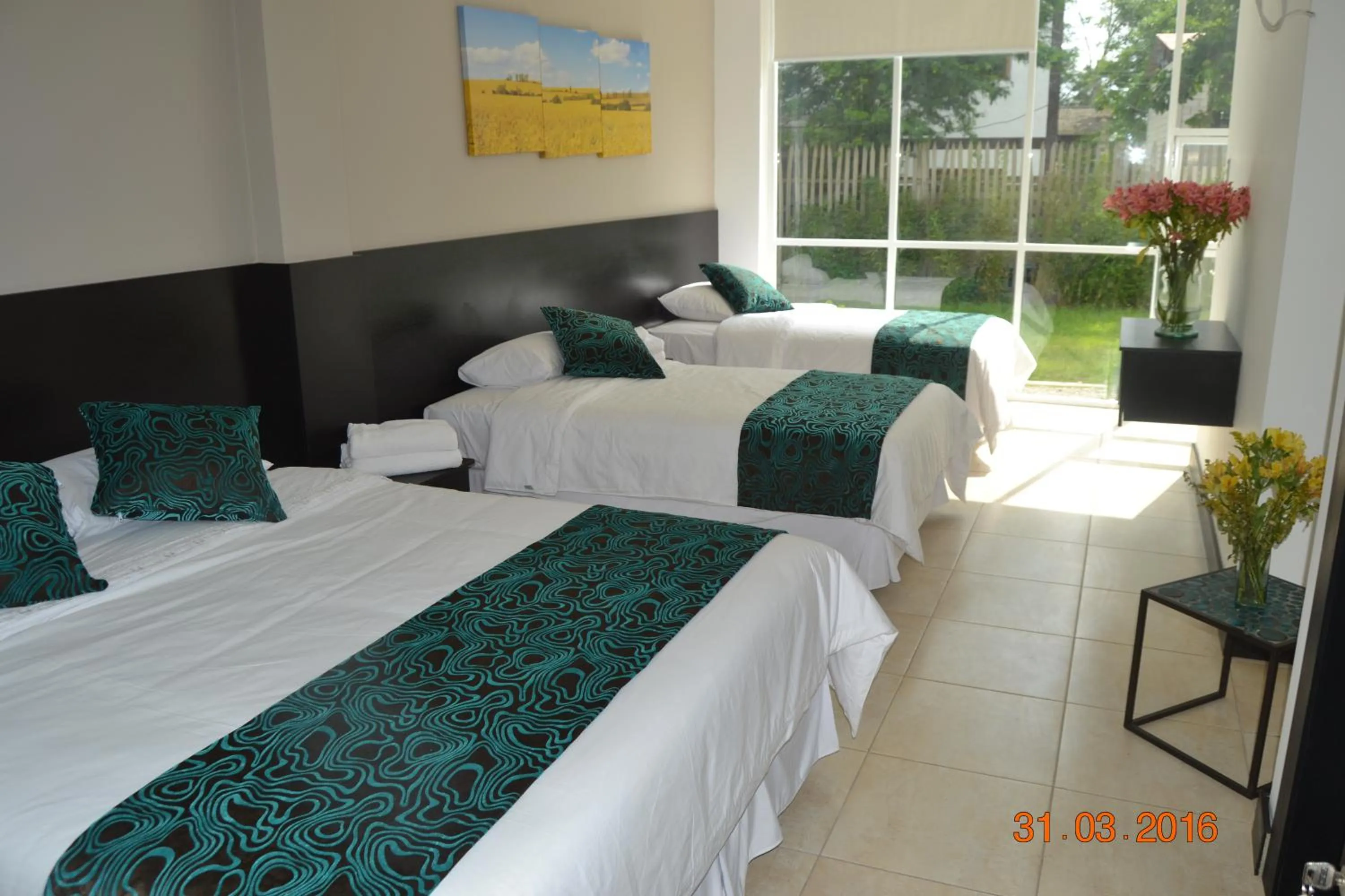 Bed in Ocean Blue Hotel