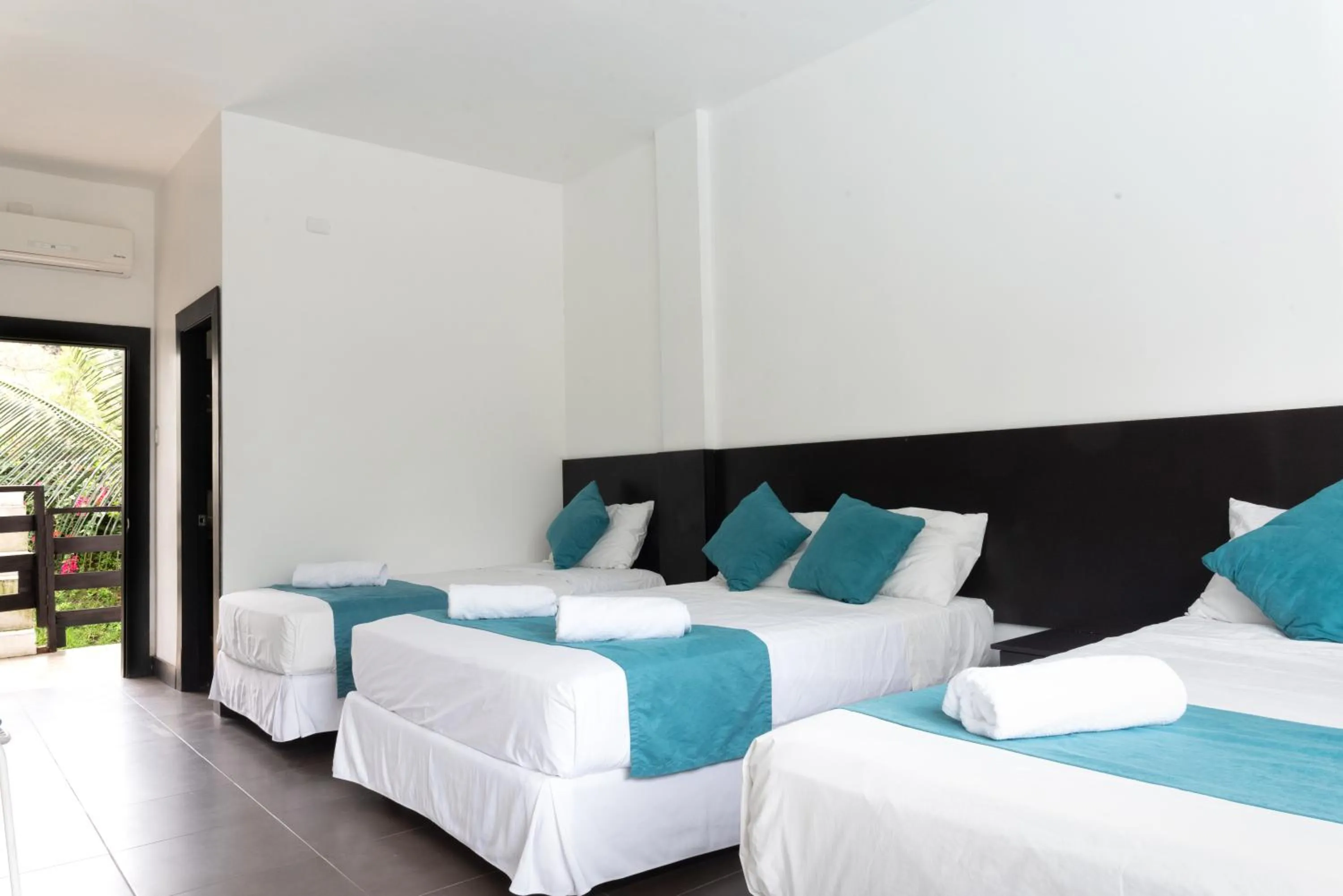 Bed in Ocean Blue Hotel