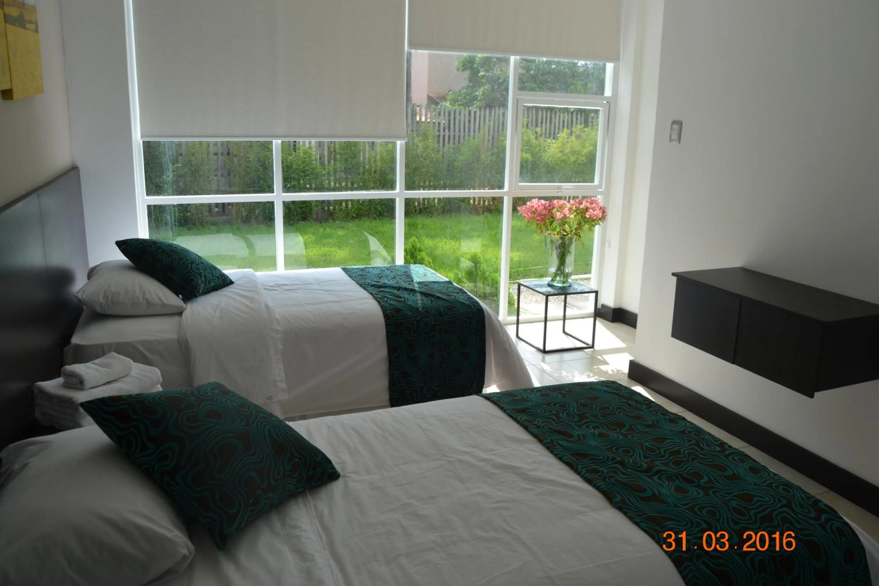 Staff, Bed in Ocean Blue Hotel