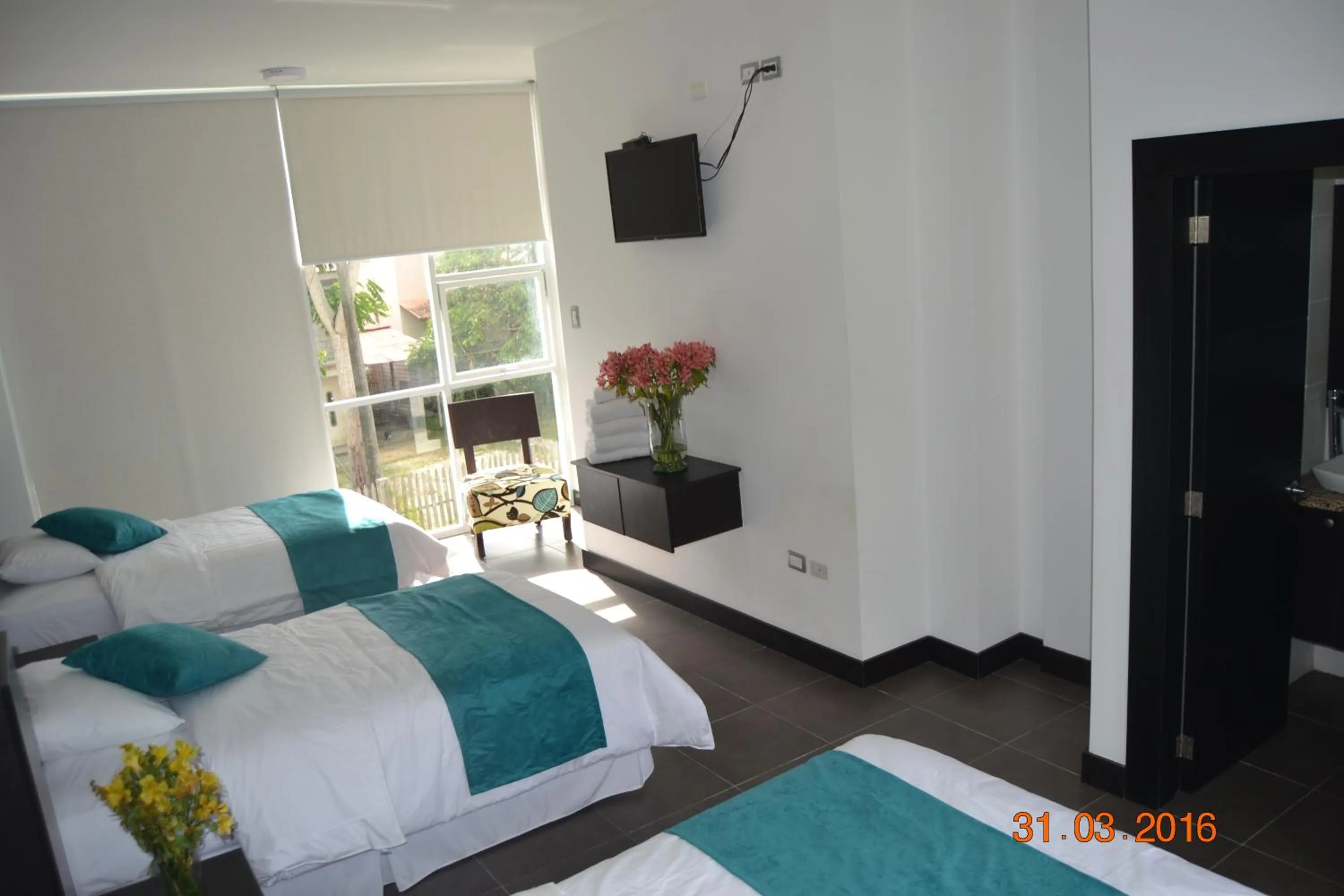 Bed in Ocean Blue Hotel