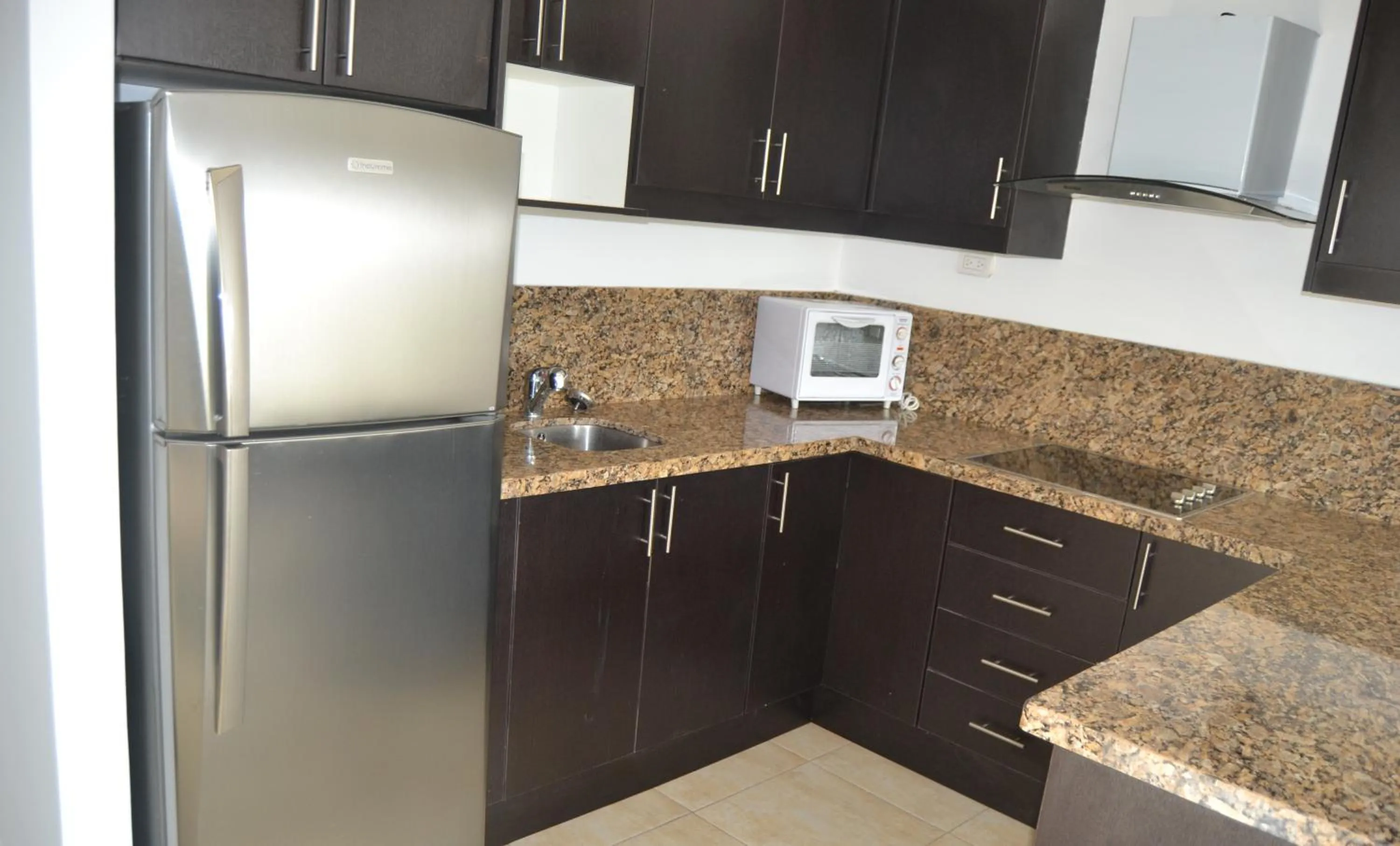 Kitchen or kitchenette in Ocean Blue Hotel