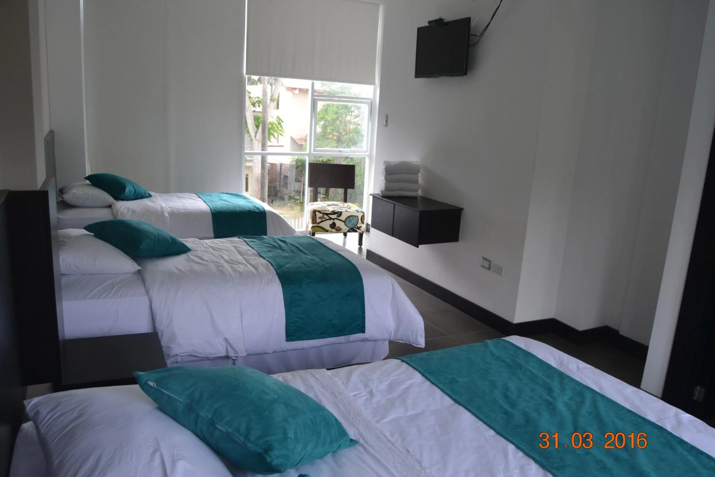 Bed in Ocean Blue Hotel