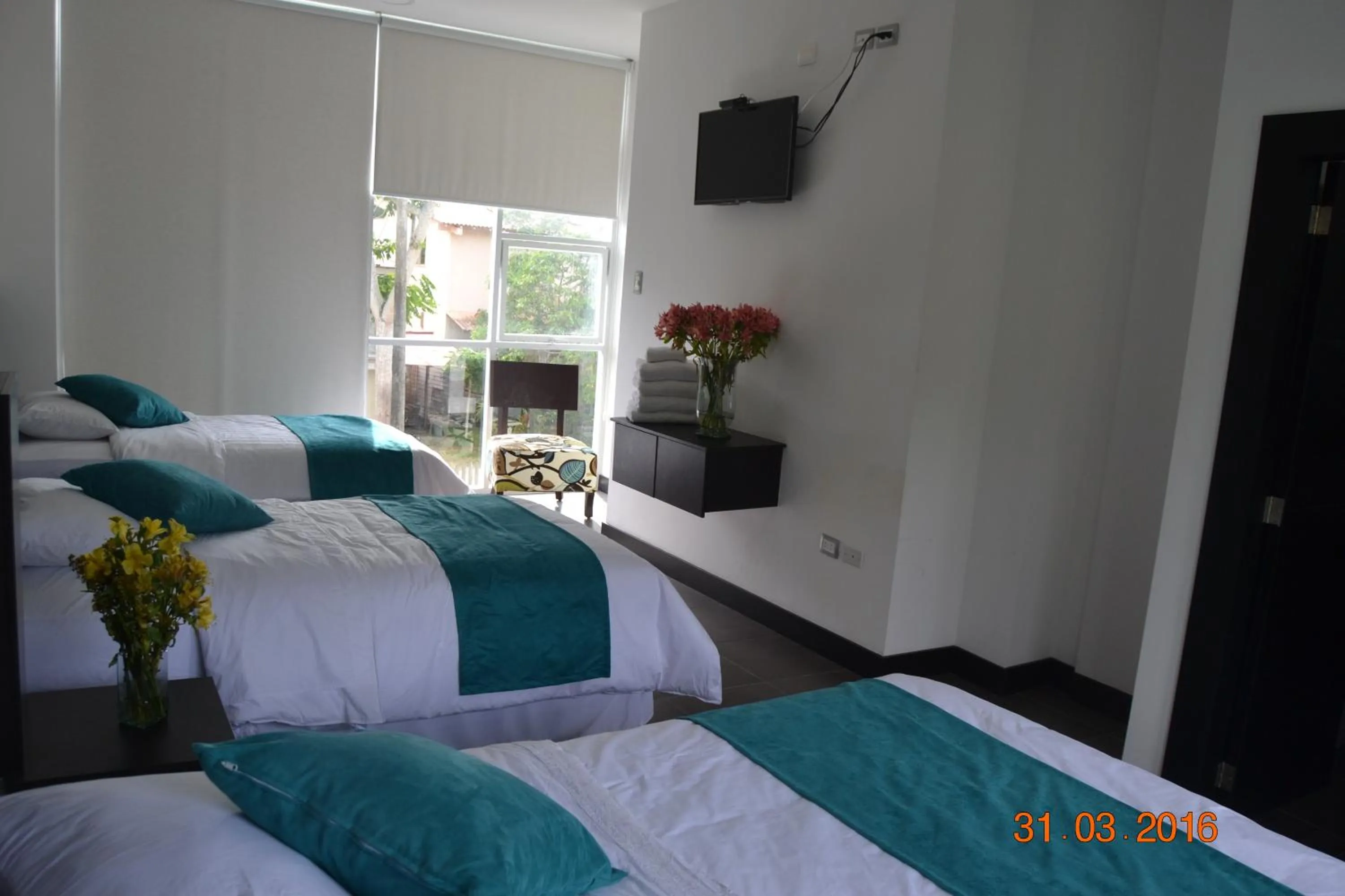 Bed in Ocean Blue Hotel