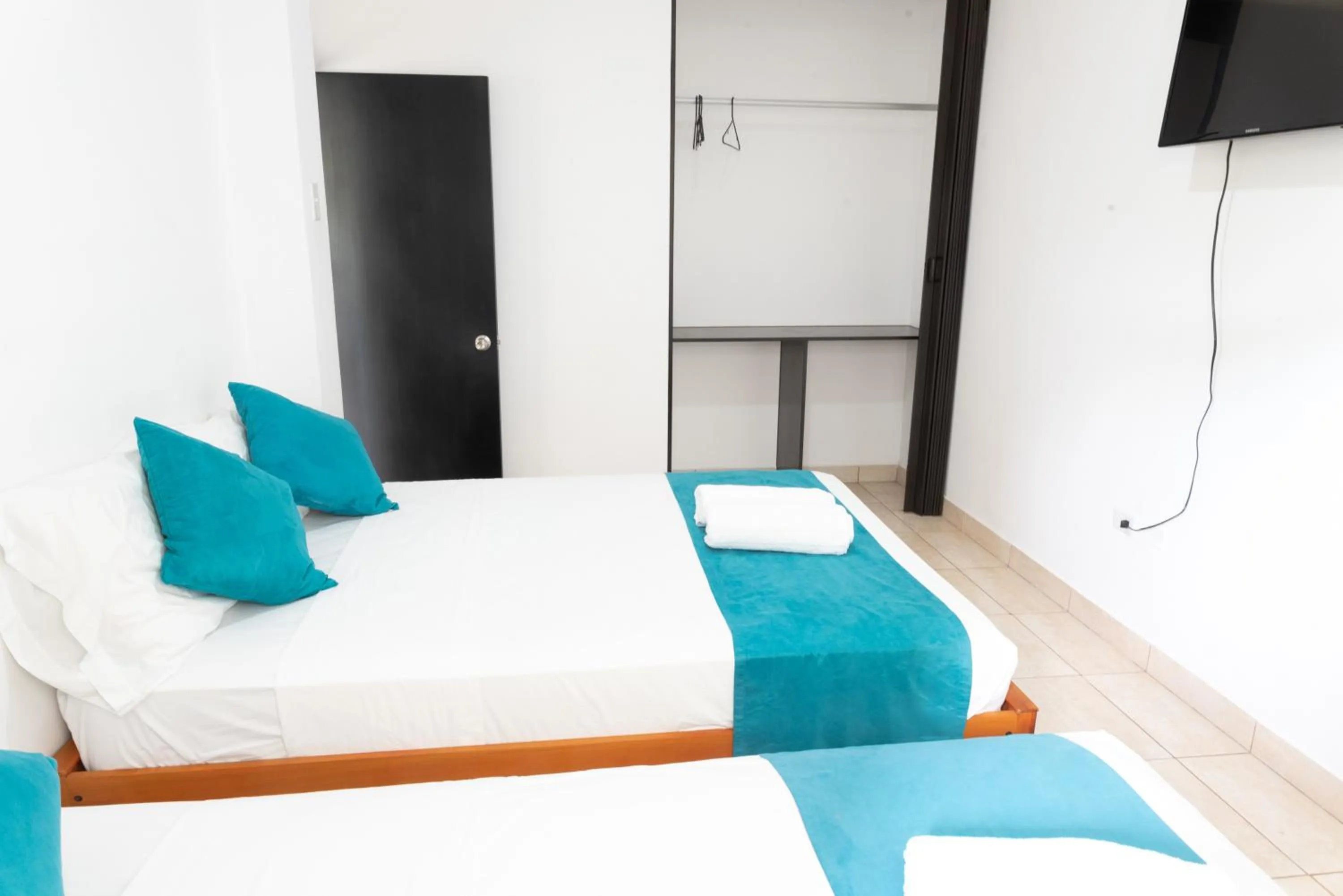 Bed in Ocean Blue Hotel