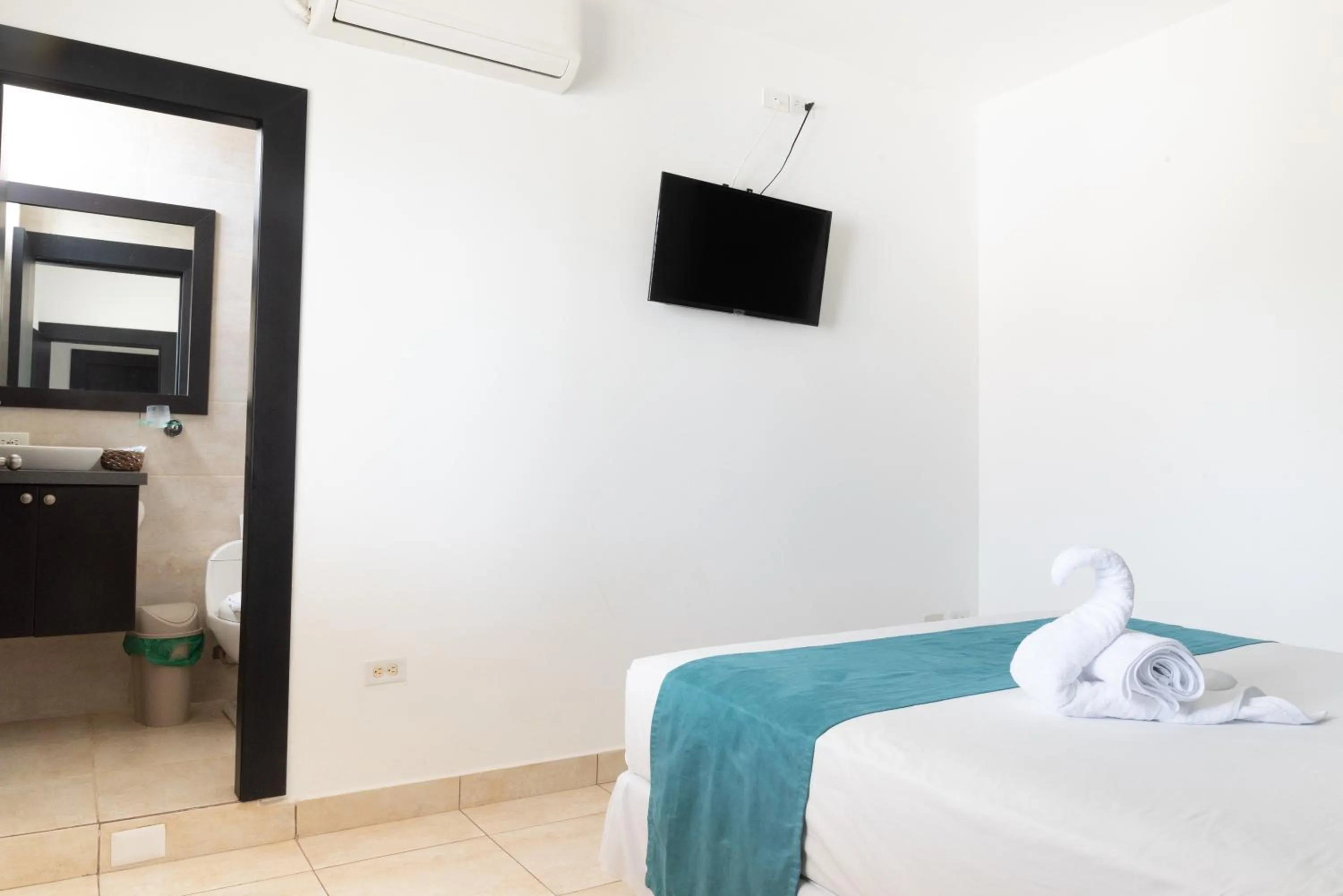 Bed in Ocean Blue Hotel