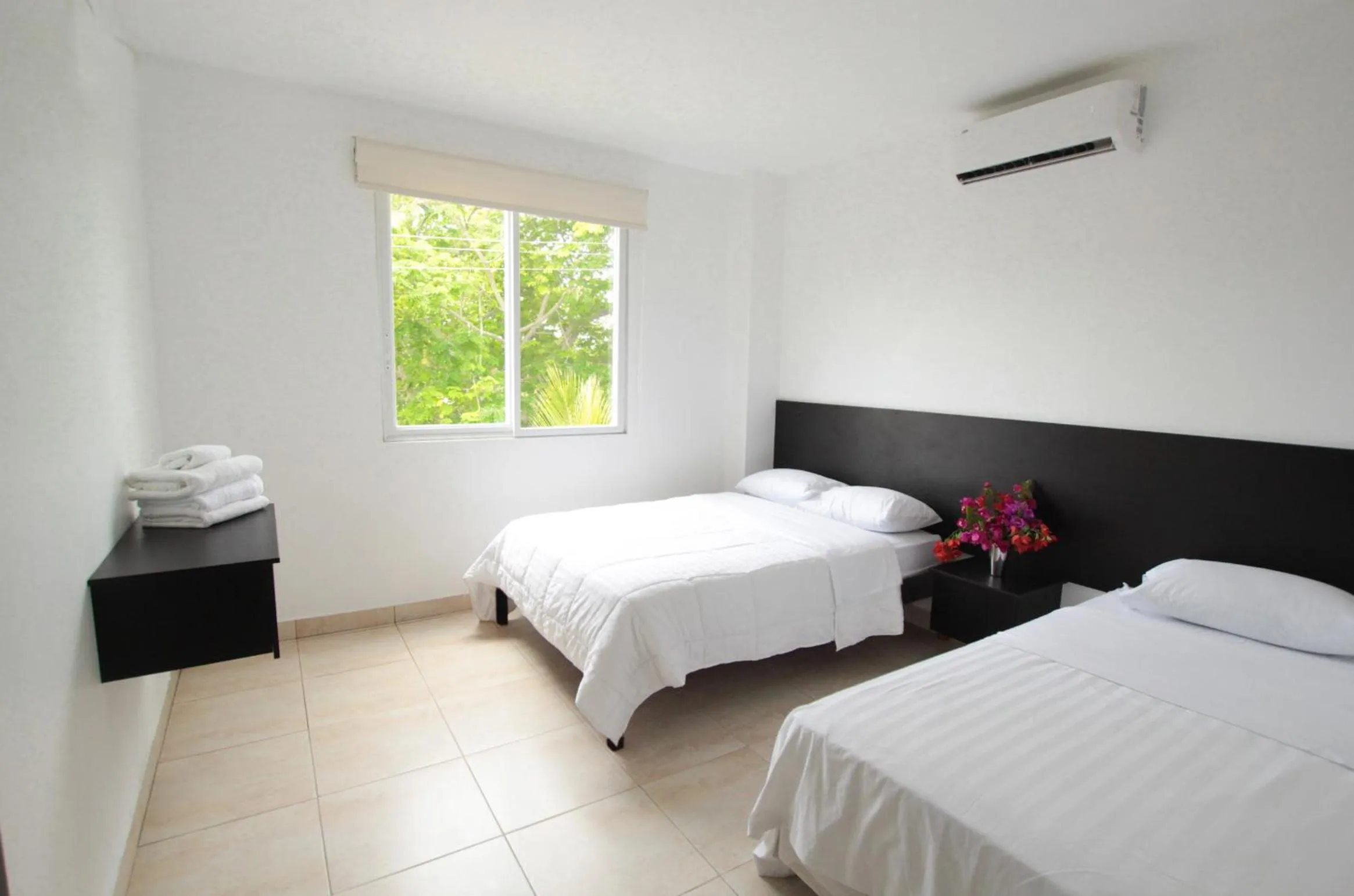 Bed in Ocean Blue Hotel