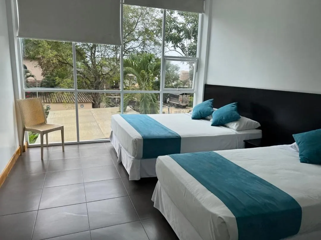 Bed in Ocean Blue Hotel