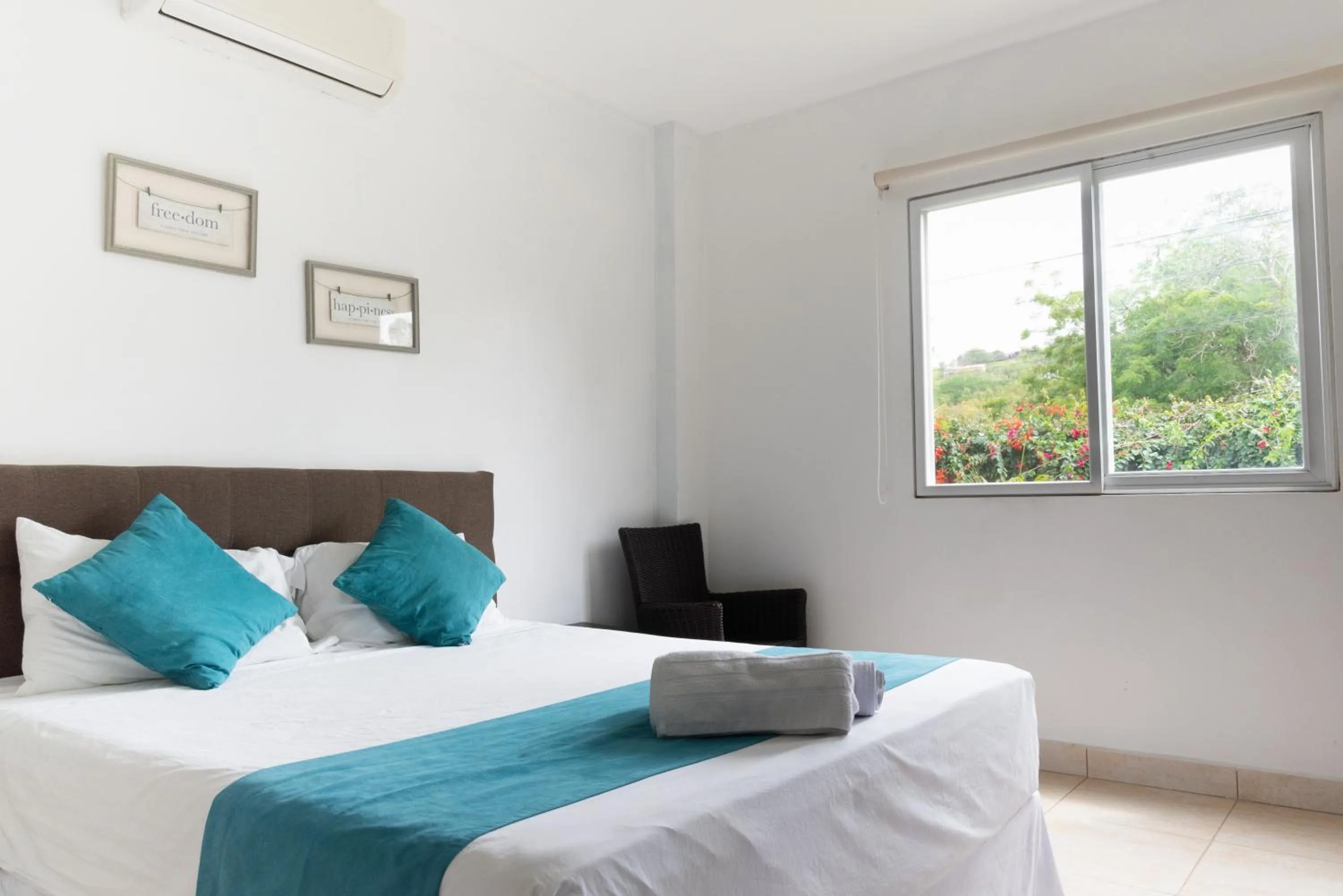 Bed in Ocean Blue Hotel