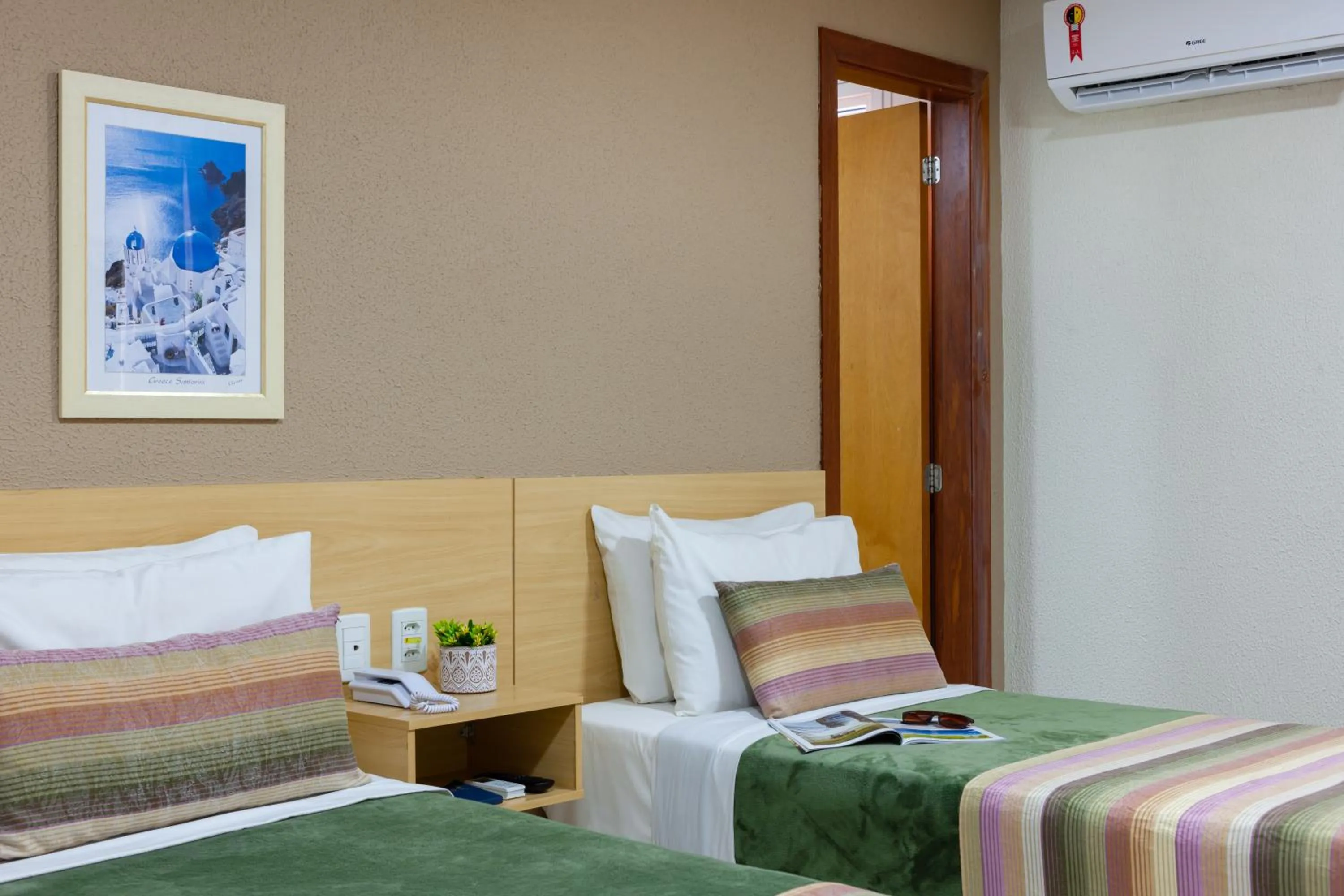 Bed in Hotel Olympia