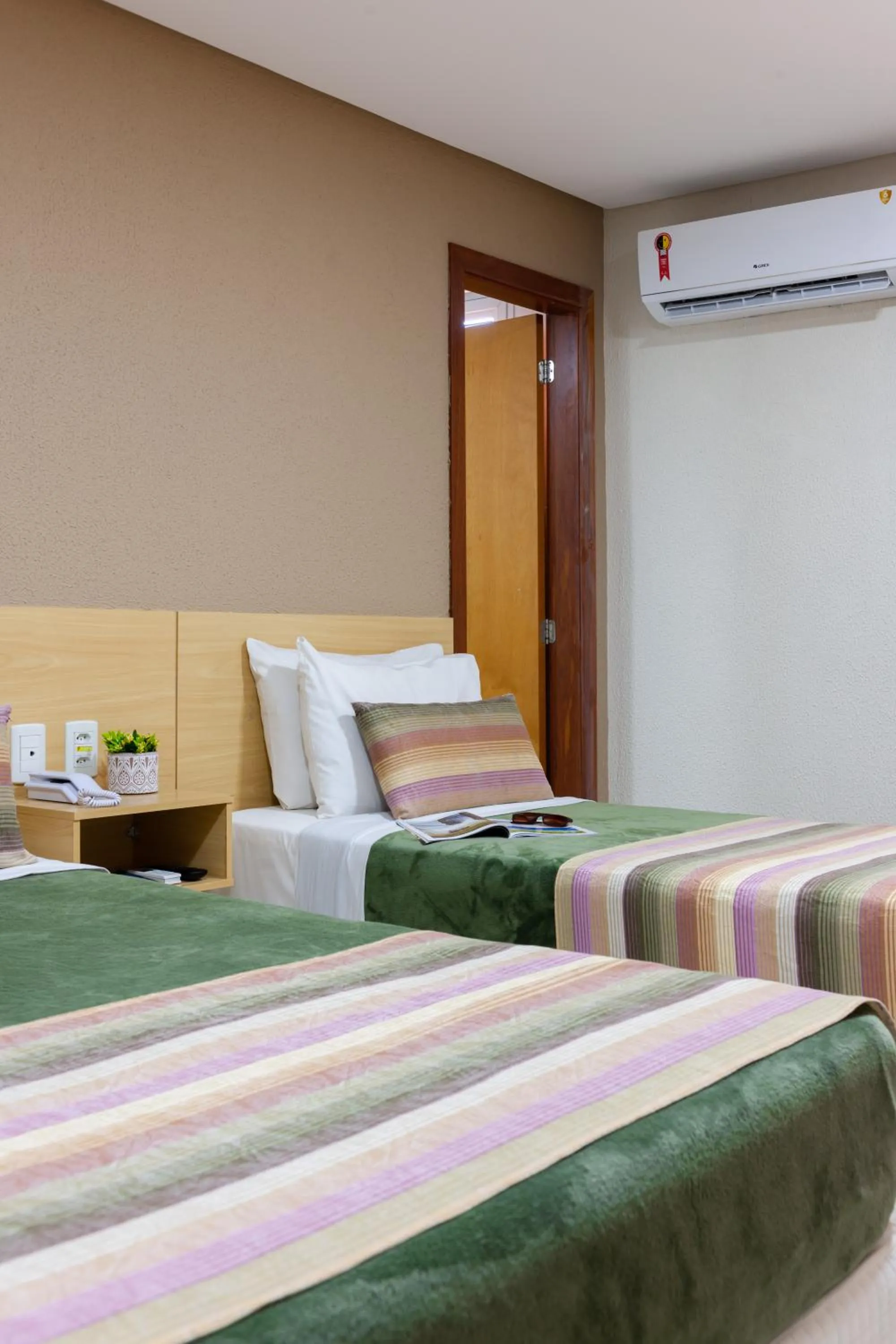 Bed in Hotel Olympia