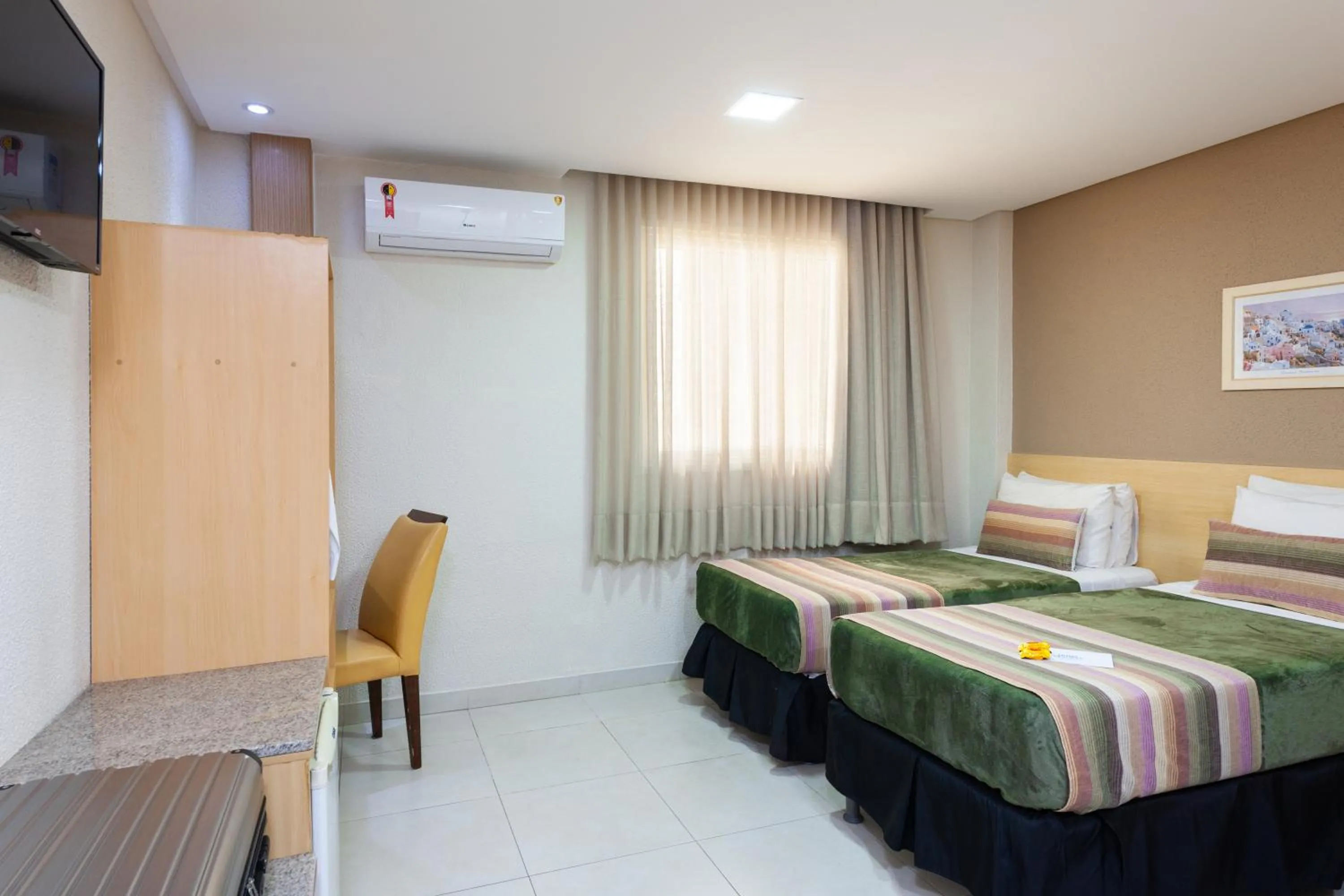 Bed in Hotel Olympia