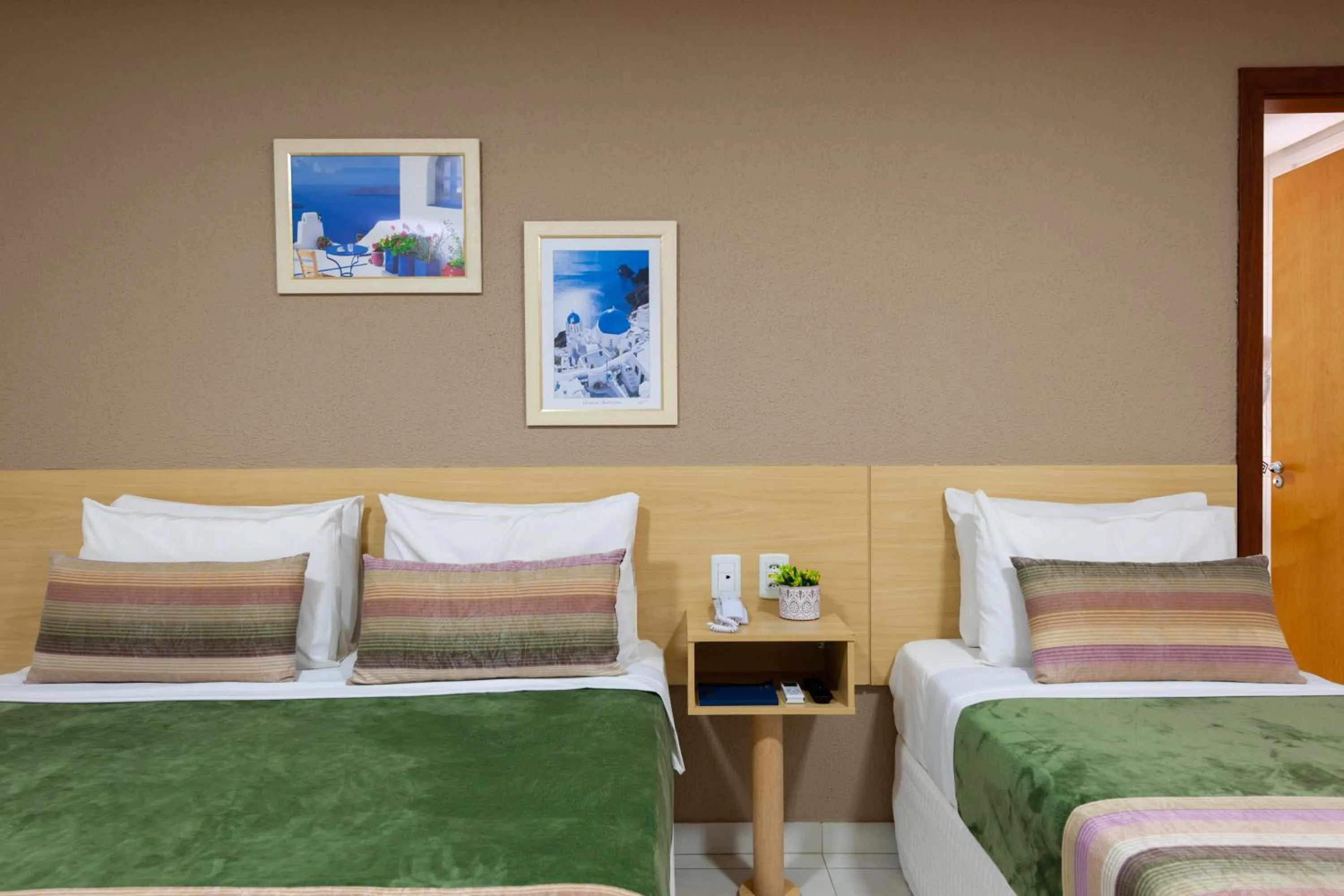 Bed in Hotel Olympia