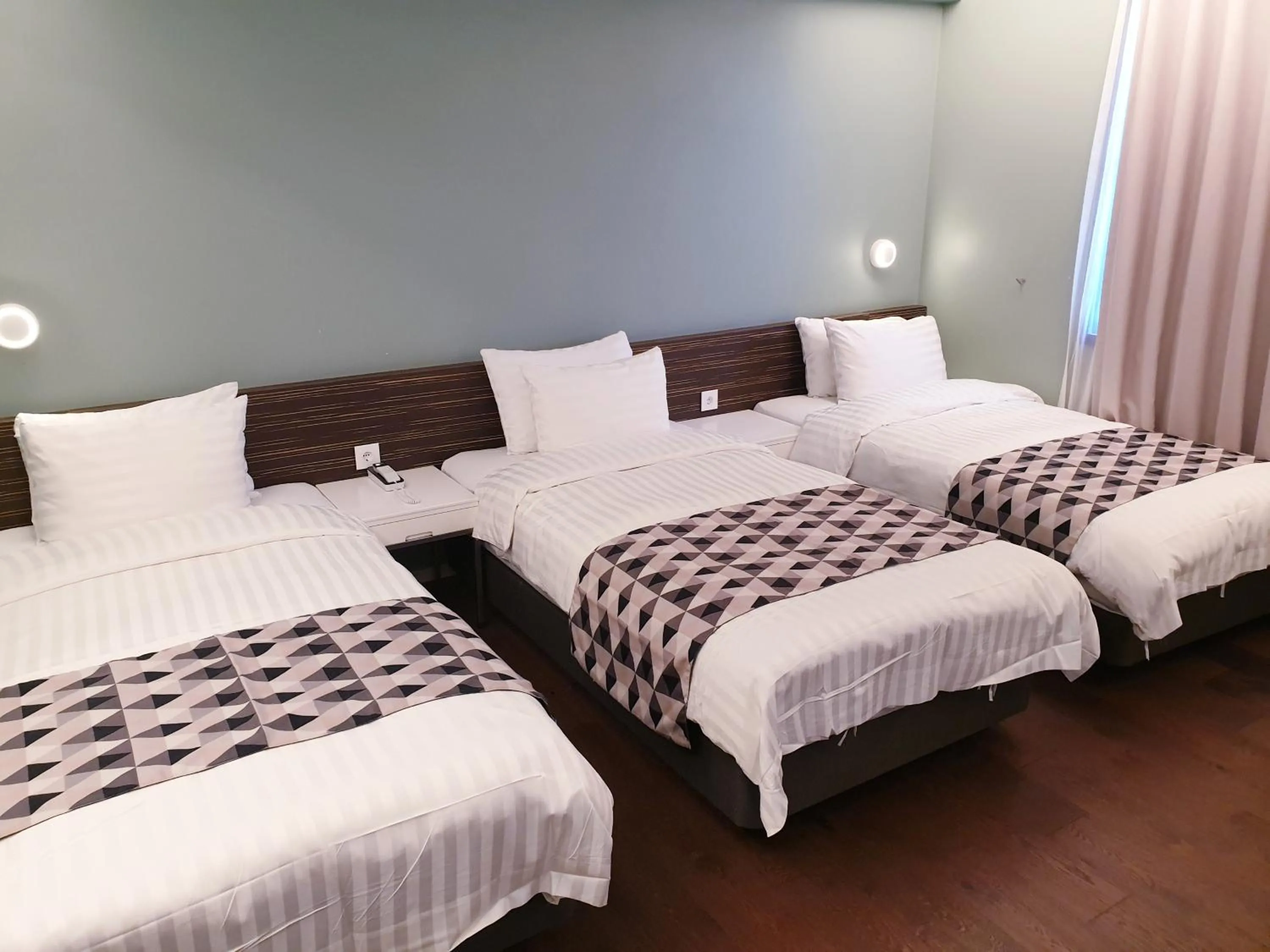 Bed in Hotel Matthieu Yeosu