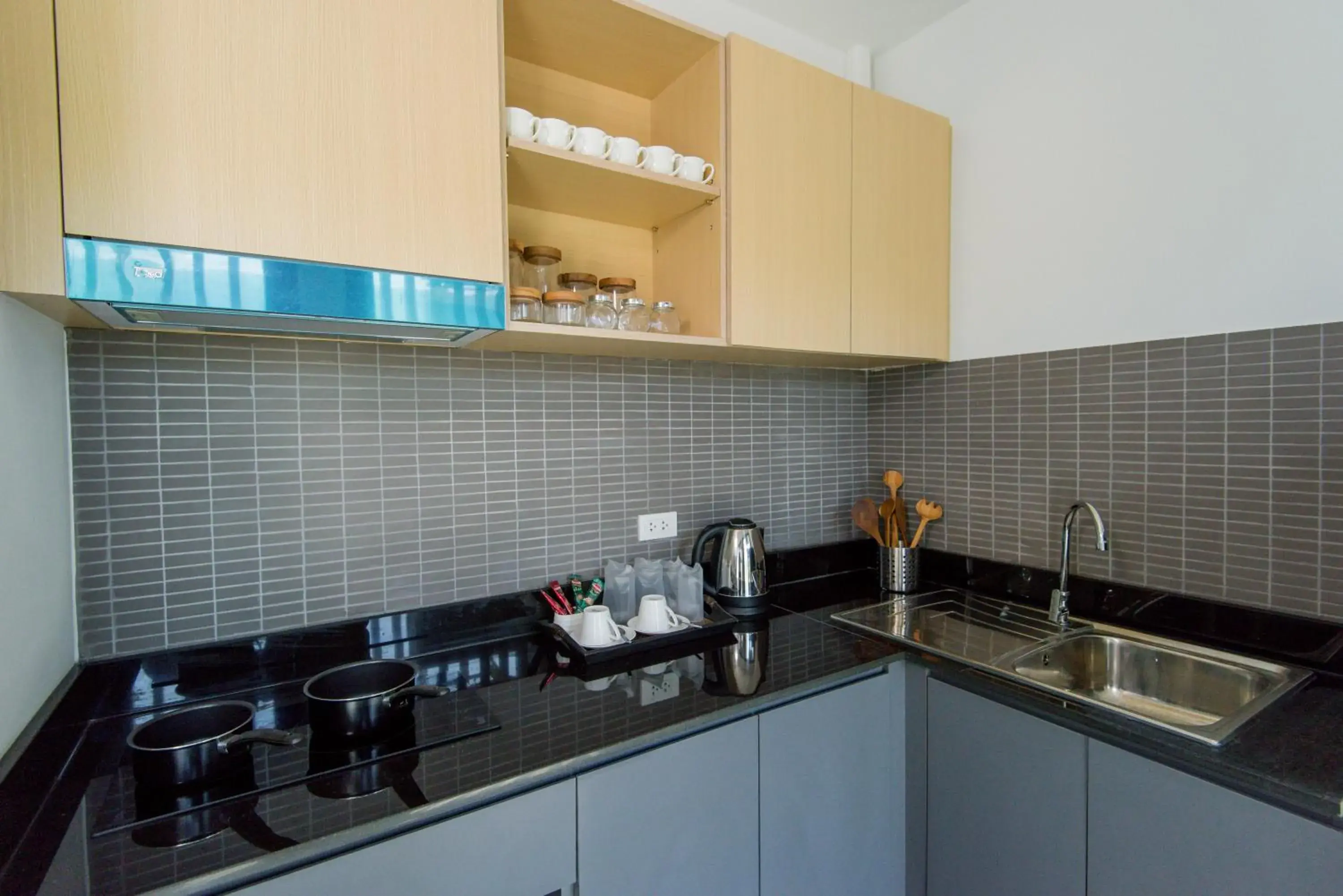 Communal kitchen in Hill Myna Condotel Official Account Communal kitchen in Hill Myna Condotel Official Account