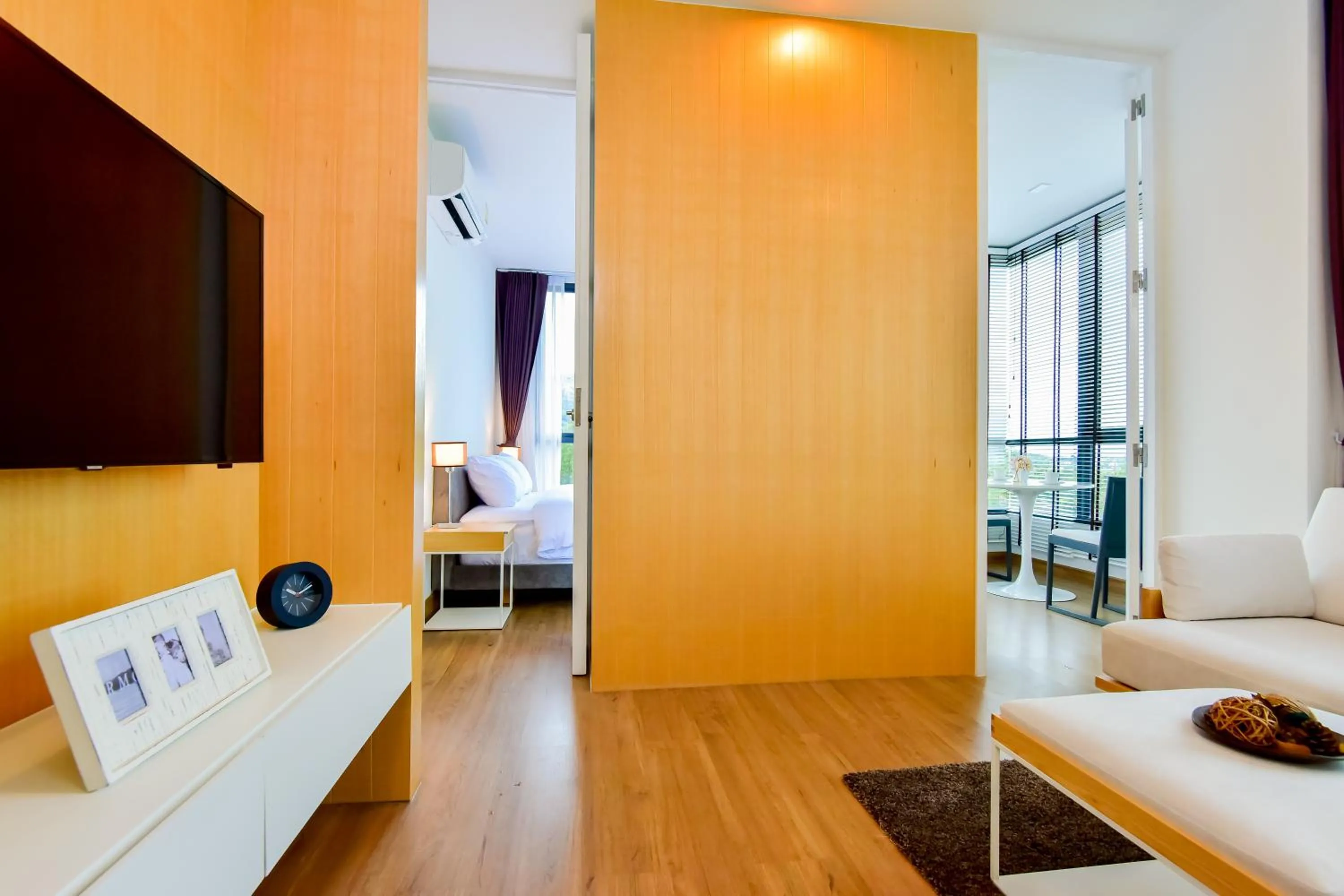 Communal lounge/ TV room, Bed in Hill Myna Condotel Official Account