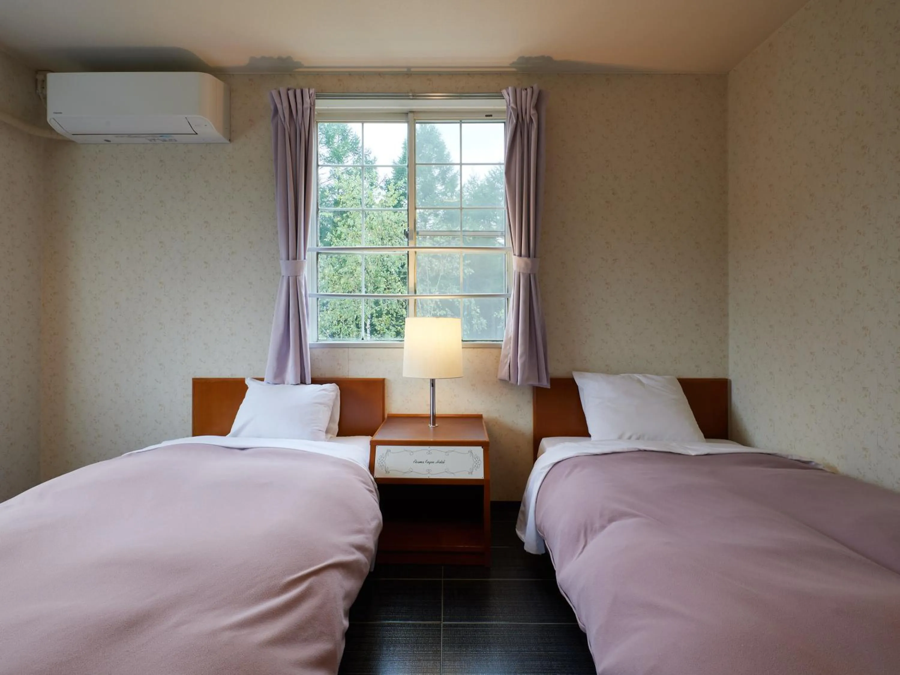 Photo of the whole room, Bed in Asama Kogen Hotel