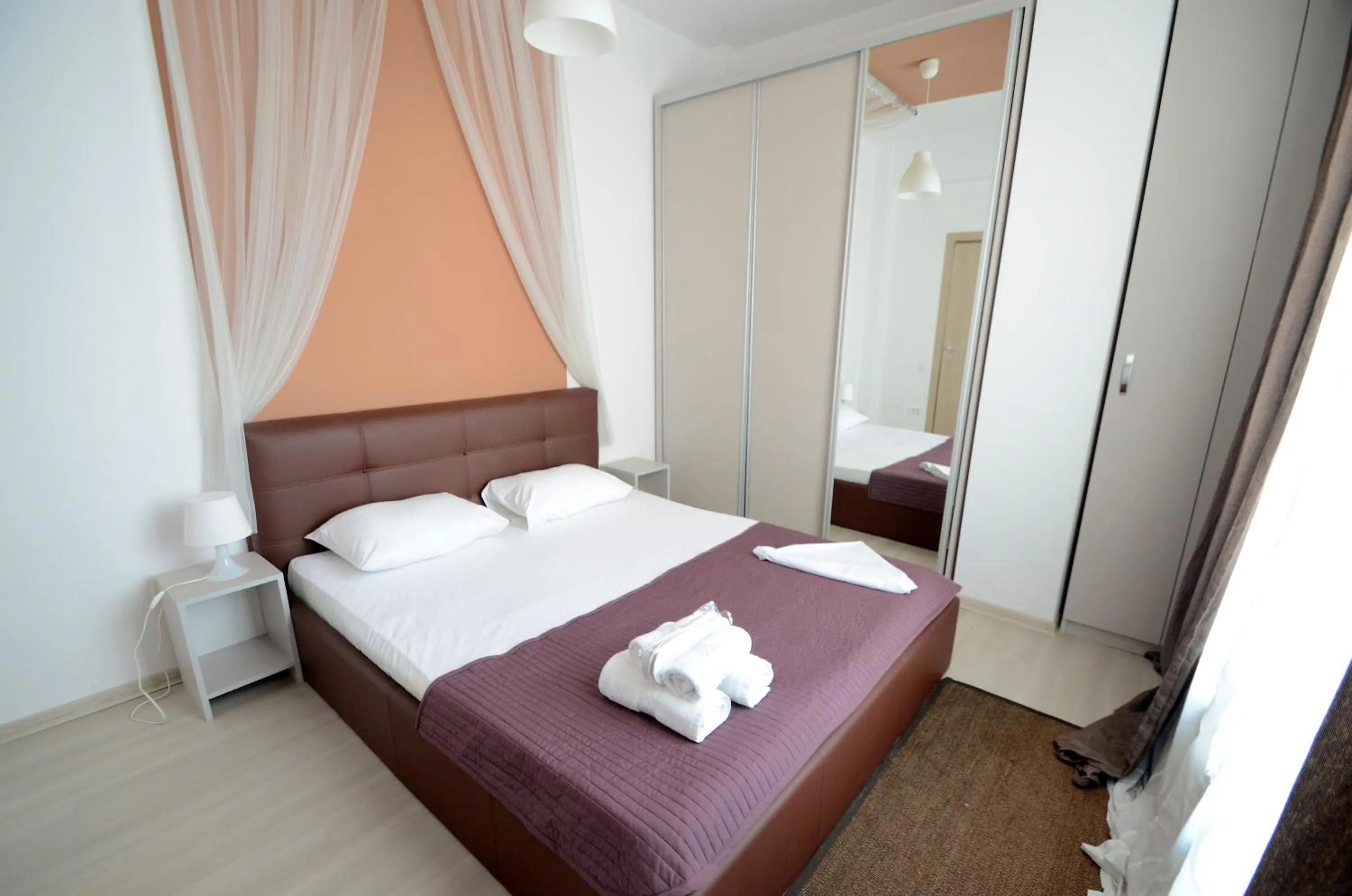 Photo of the whole room, Bed in Uptown Residence Apartments