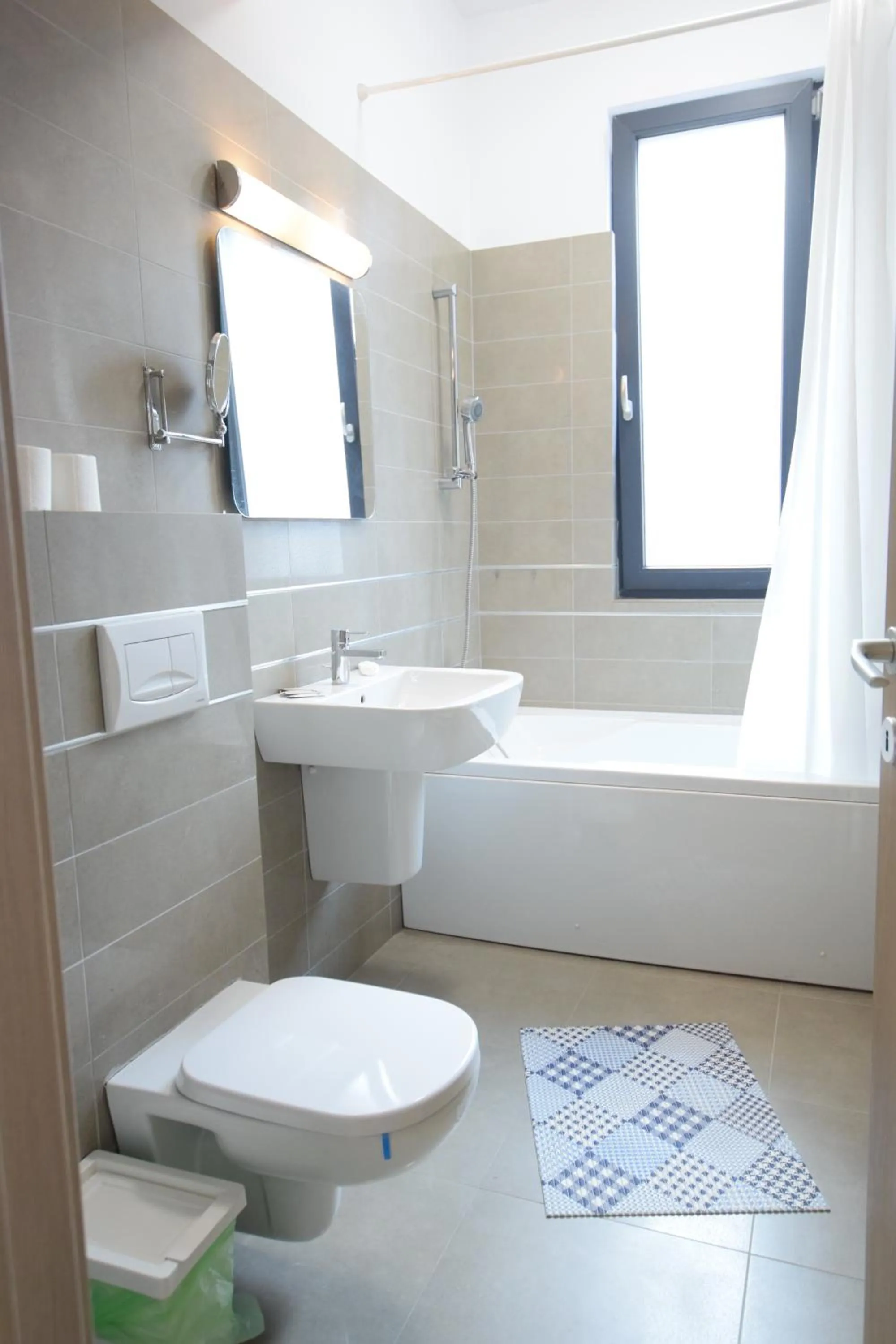 Bathroom in Uptown Residence Apartments