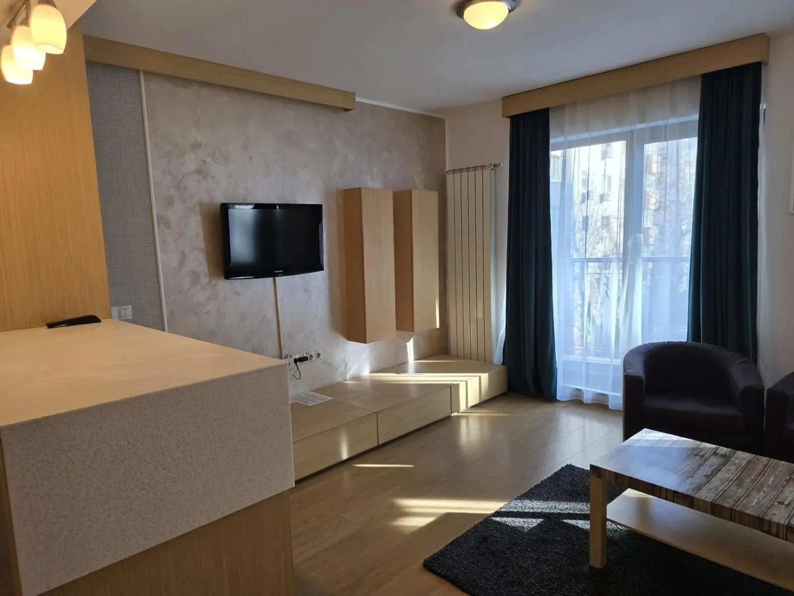 Communal lounge/ TV room, Bed in Decebal Residence Apartments