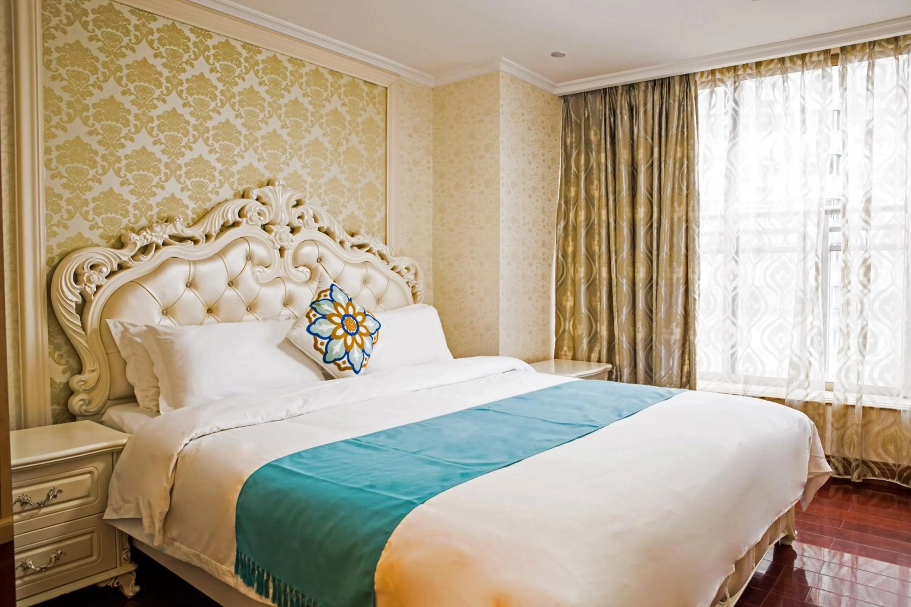 Bed in WAIFIDEN Guangzhou HaiZhu Square WanYi Apartment