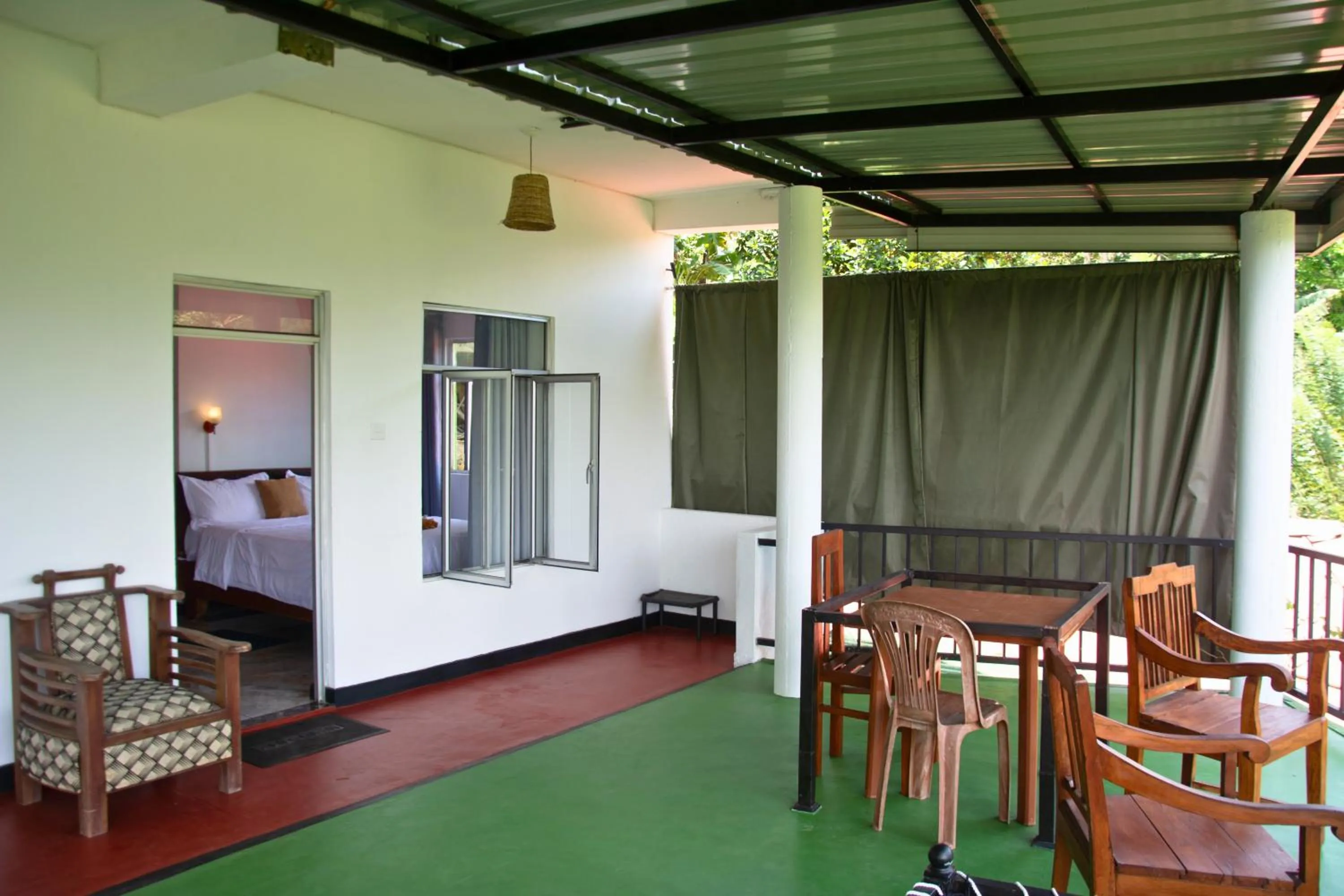 Seating area, Bed in 9 Arch view rest inn
