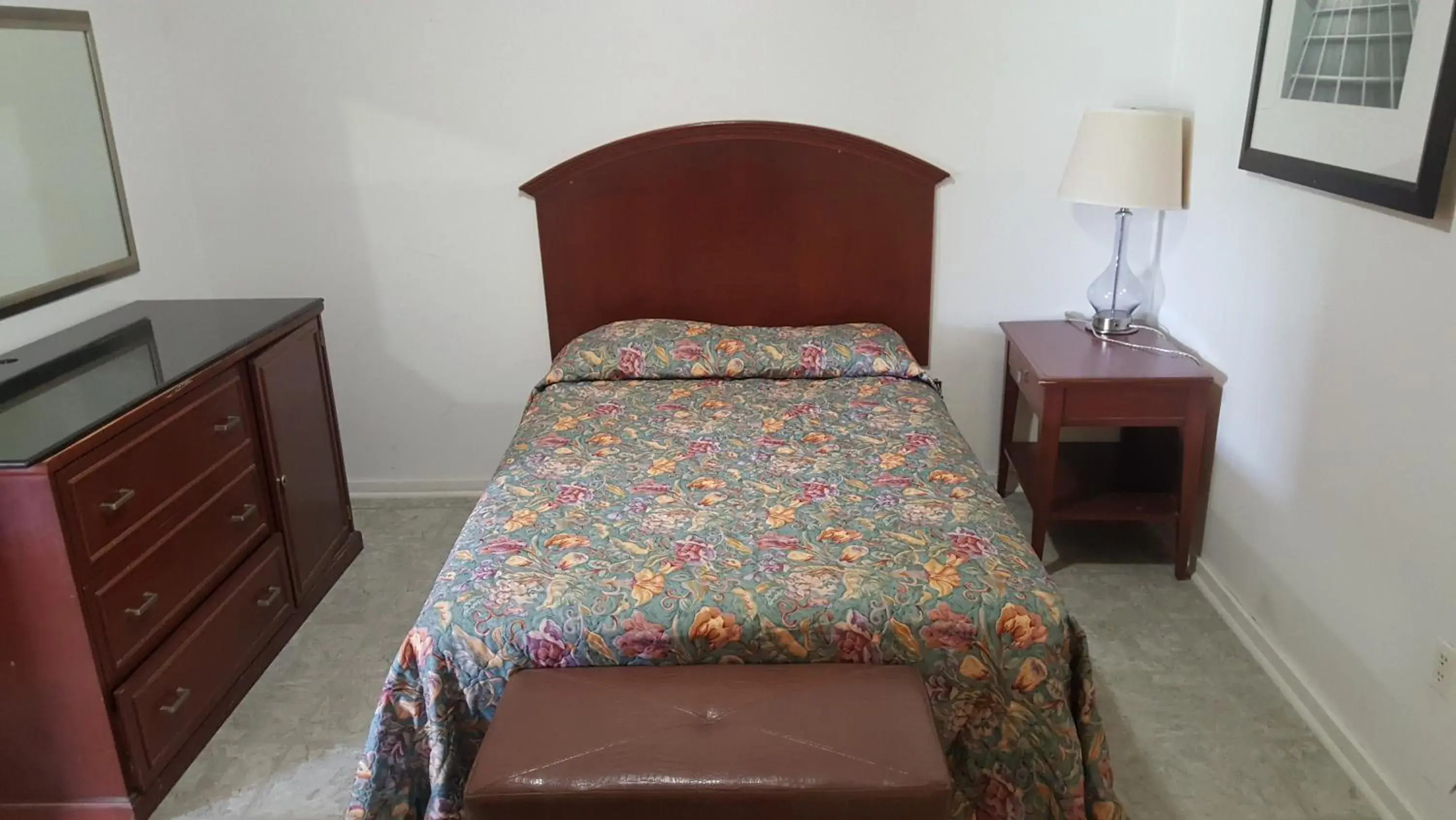 Bed in Monte Carlo Motel