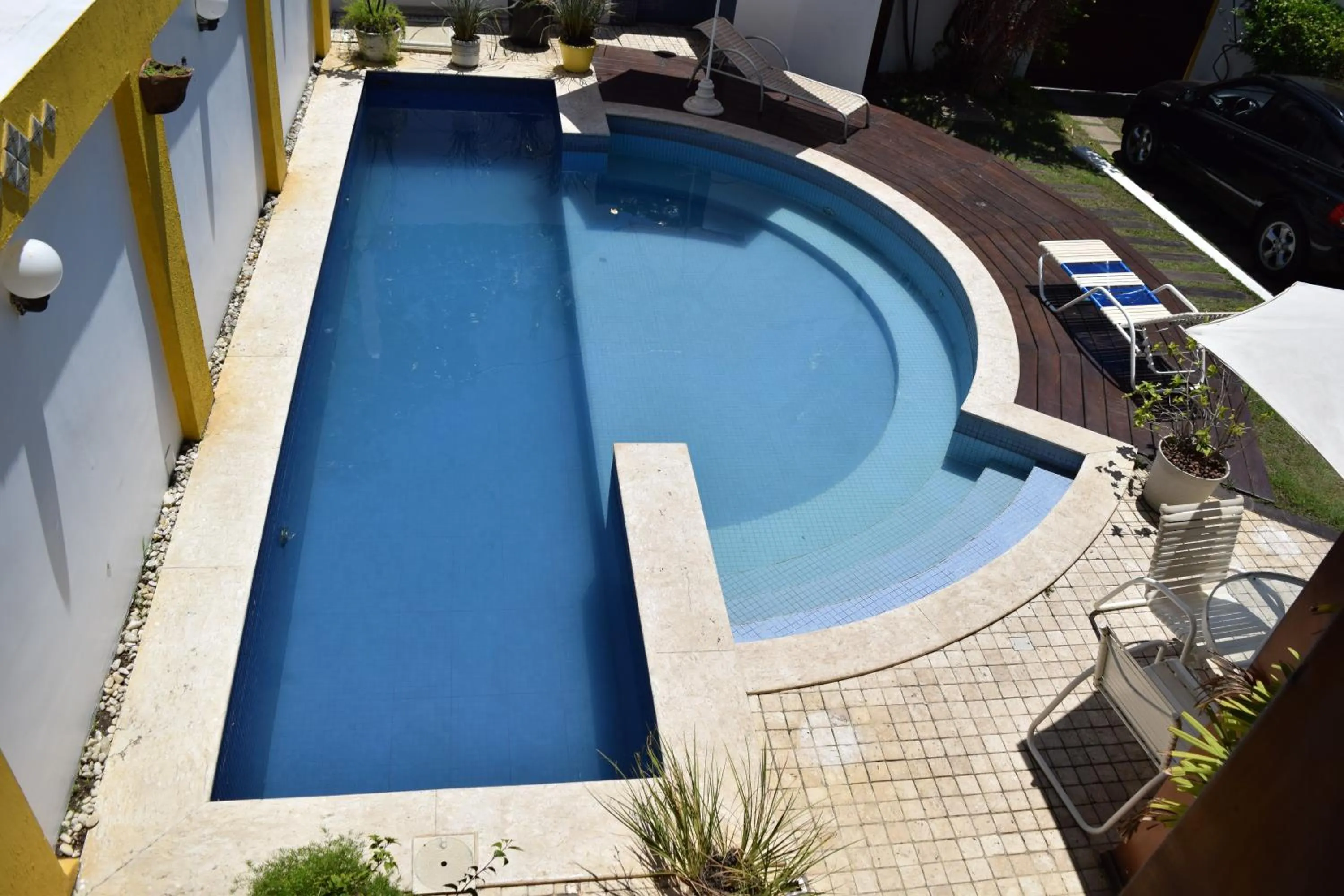 Swimming pool in Hotel Pousada Encanto de Itapoan