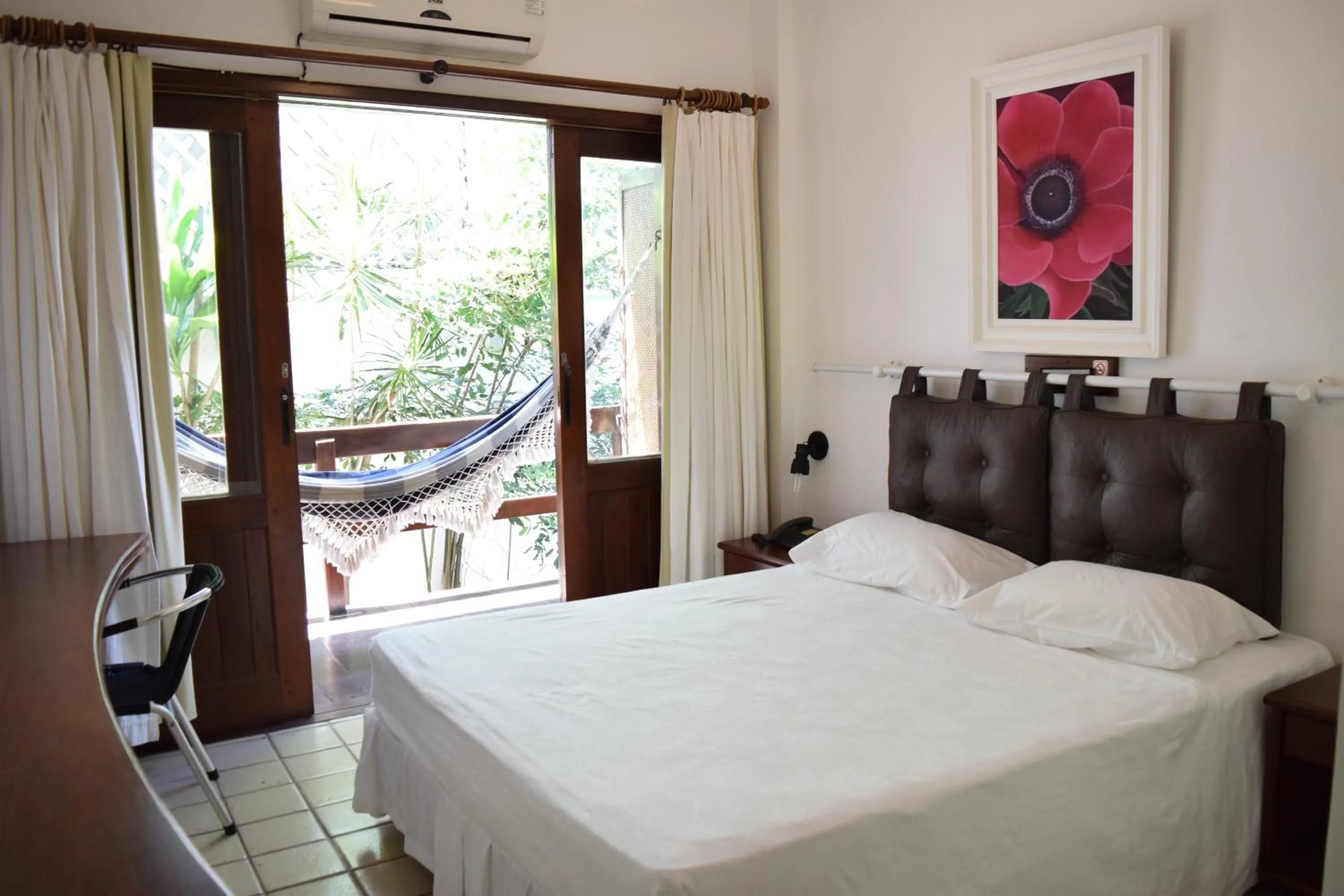 Bedroom, Bed in Hotel Pousada Encanto de Itapoan