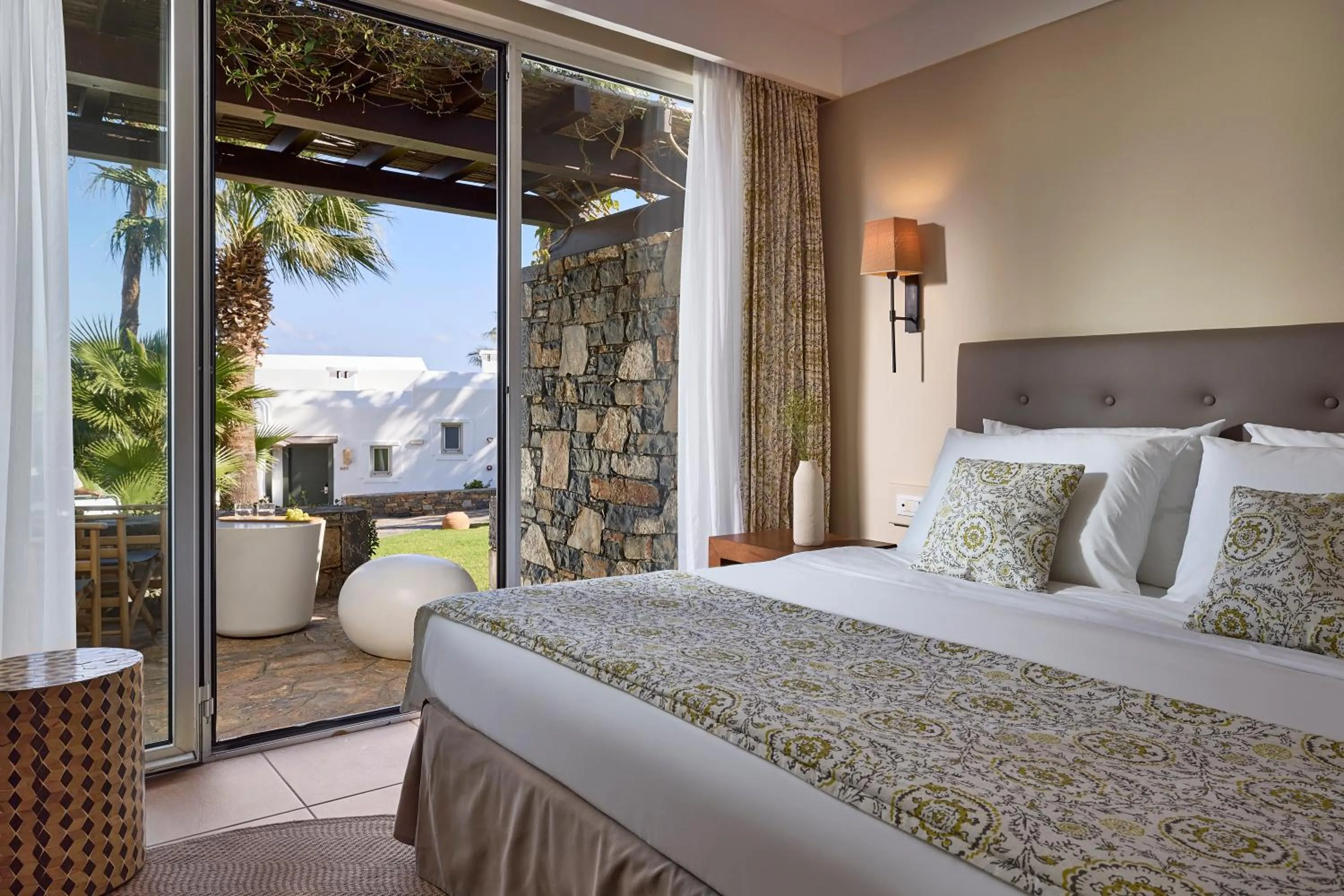 Bedroom, Bed in Aquila Elounda Village Resort, Suites & Spa