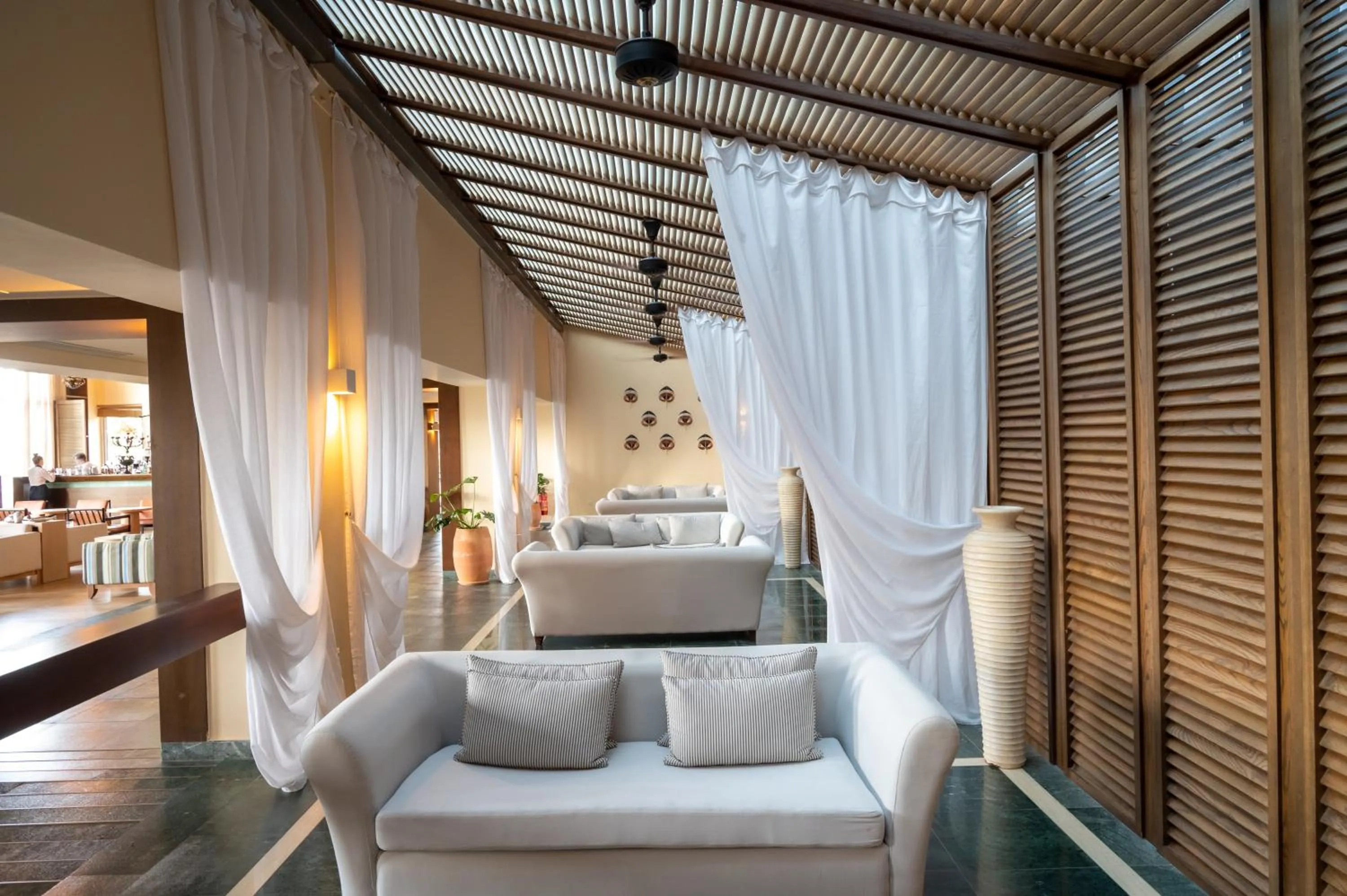 Lounge or bar, Bed in Aquila Elounda Village Resort, Suites & Spa