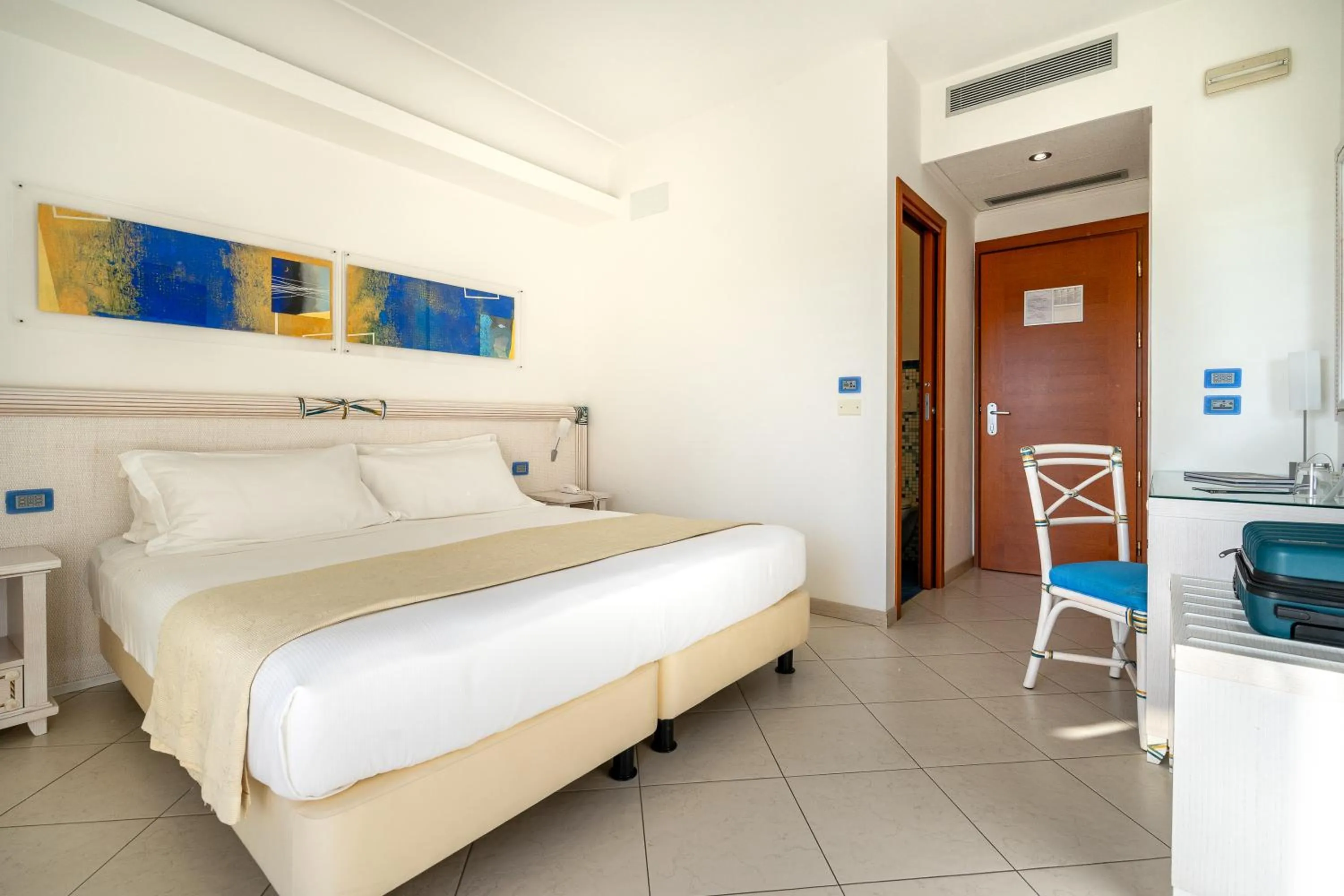 Bed in Elaia Garden Hotel