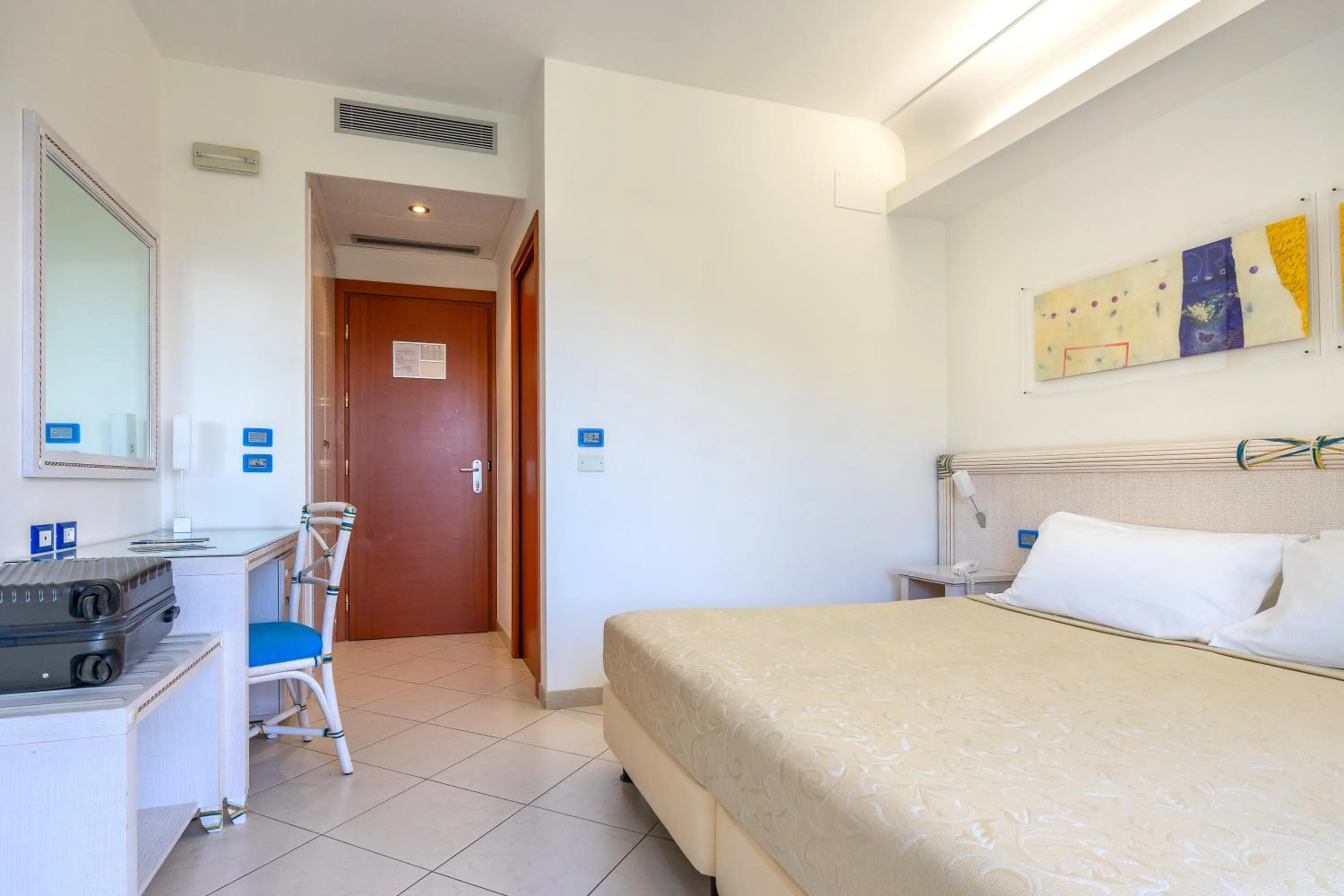 Bed in Elaia Garden Hotel