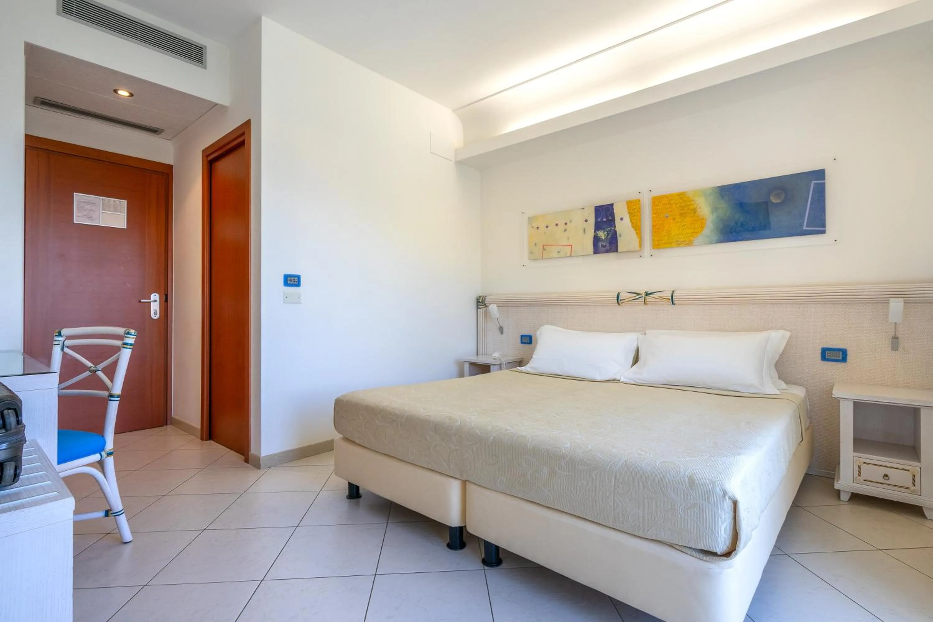 Bed in Elaia Garden Hotel