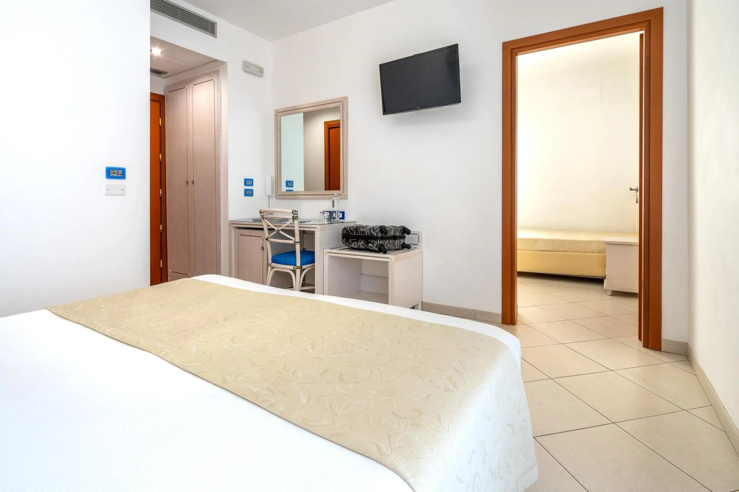 Bed in Elaia Garden Hotel