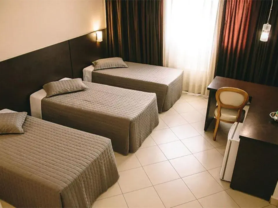 Standard Triple Room in Hotel Dunamys Curitiba Standard Triple Room in Hotel Dunamys Curitiba