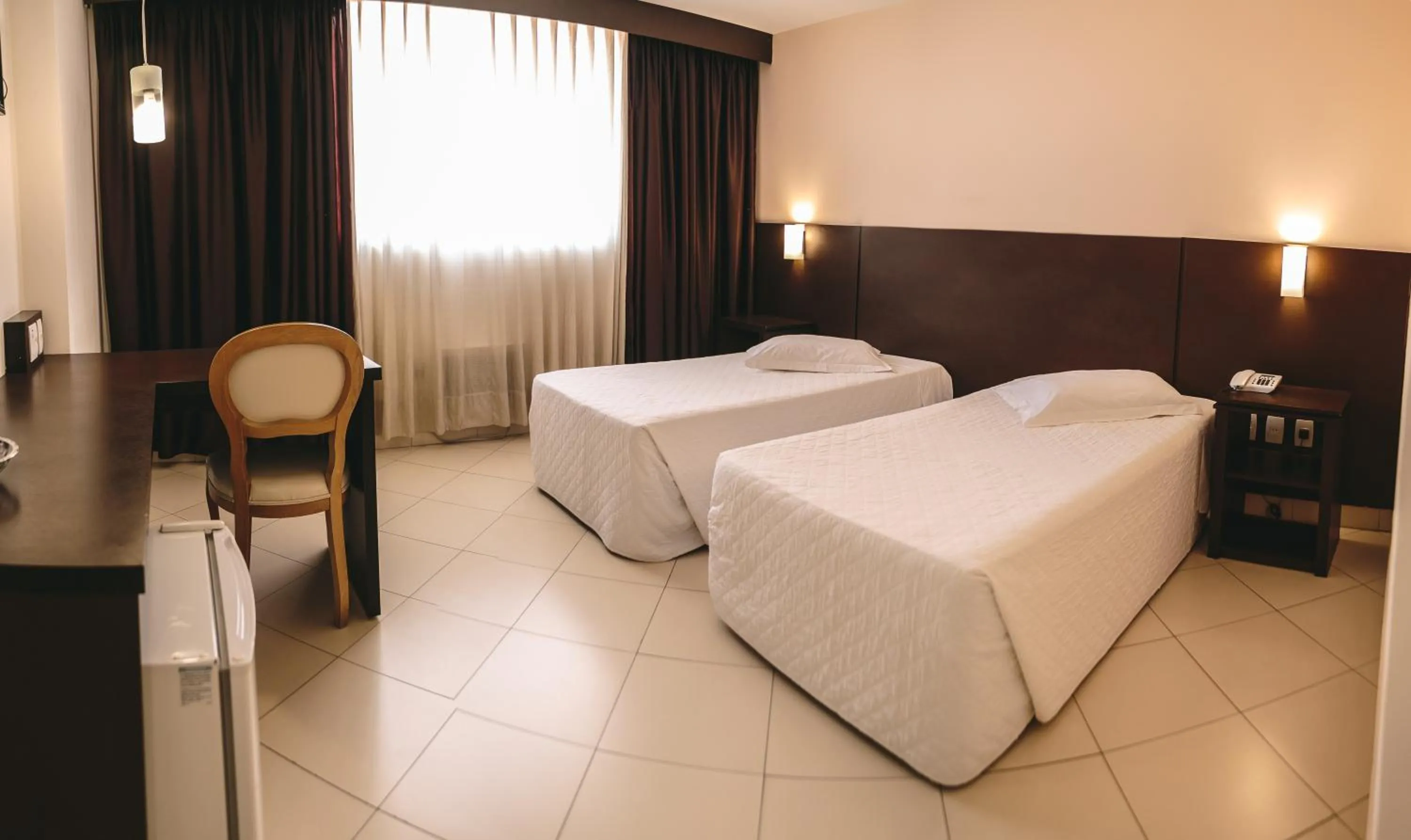 Photo of the whole room, Bed in Hotel Dunamys Curitiba